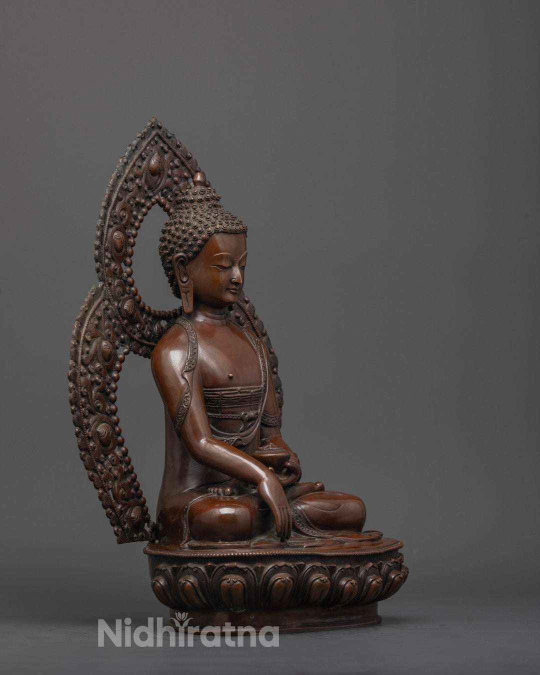Side view of Traditional Siddhartha Gautama statue from Patan Nepal, featuring a serene face