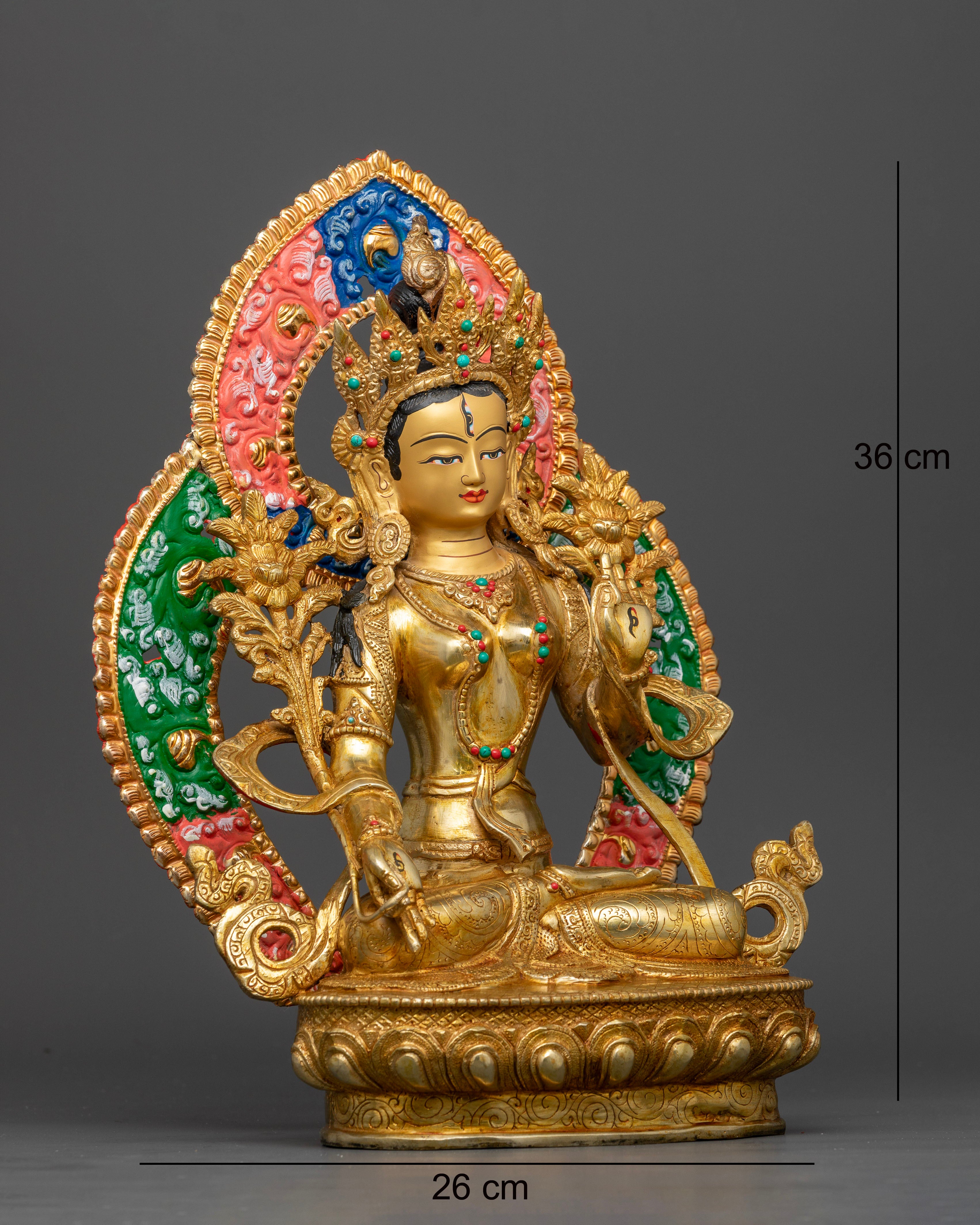 Side view of White Tara statue displaying celestial ornaments and flowing silk-like garments