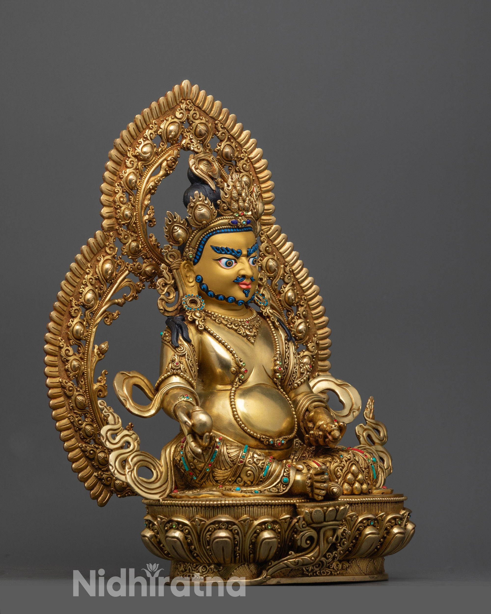 Side view of authentic Tibetan Buddhist Dzambhala God of Wealth statue