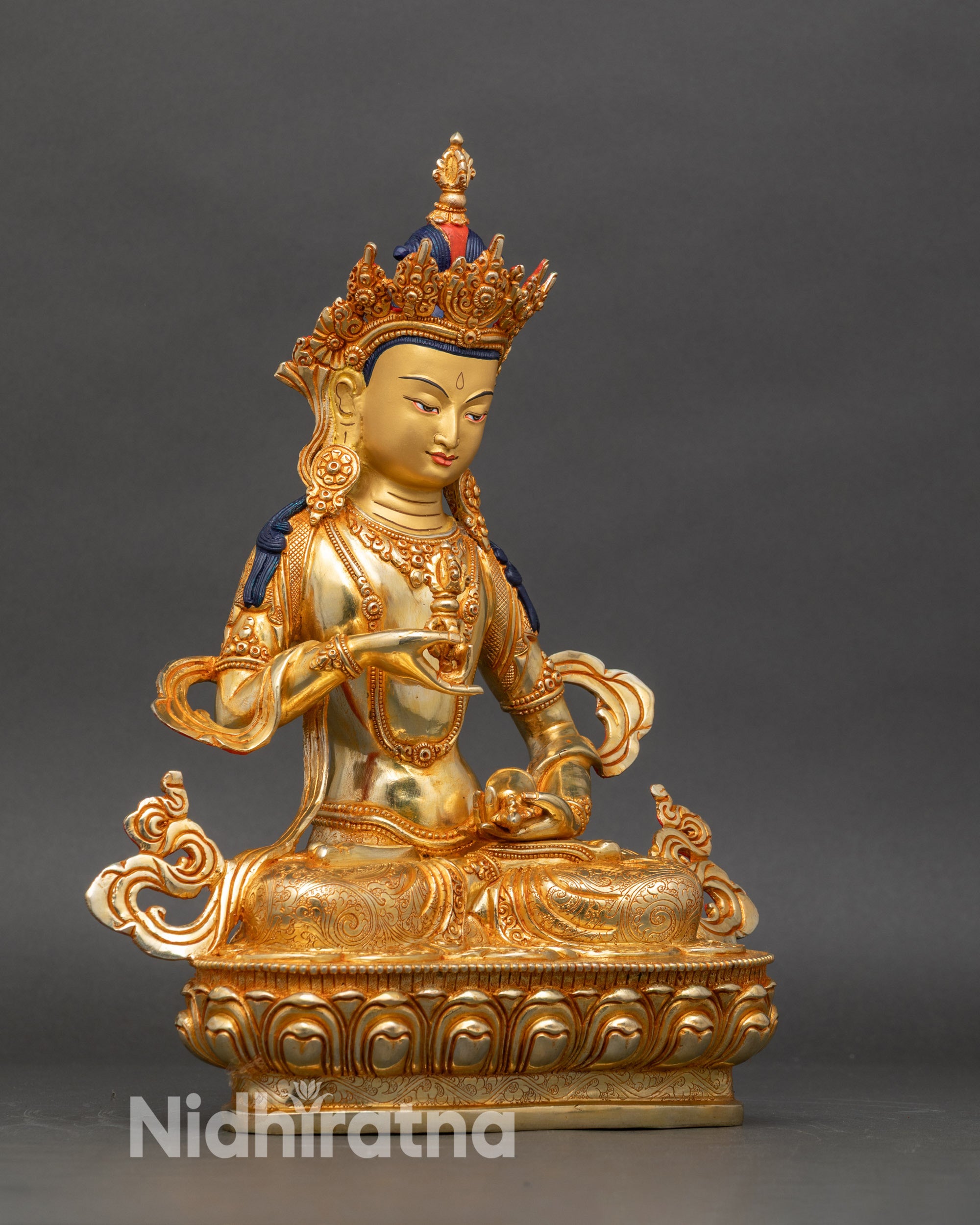 Side view of gold-gilded Vajrasattva statue for spiritual purification and Vajrayana practice