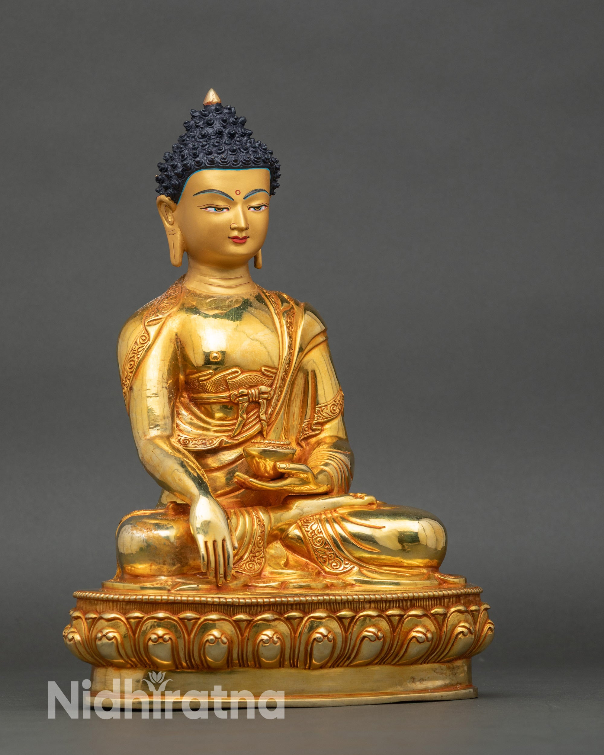 Side view of sitting Buddha holding patra bowl in bhumisparsha mudra, Nepalese craftsmanship