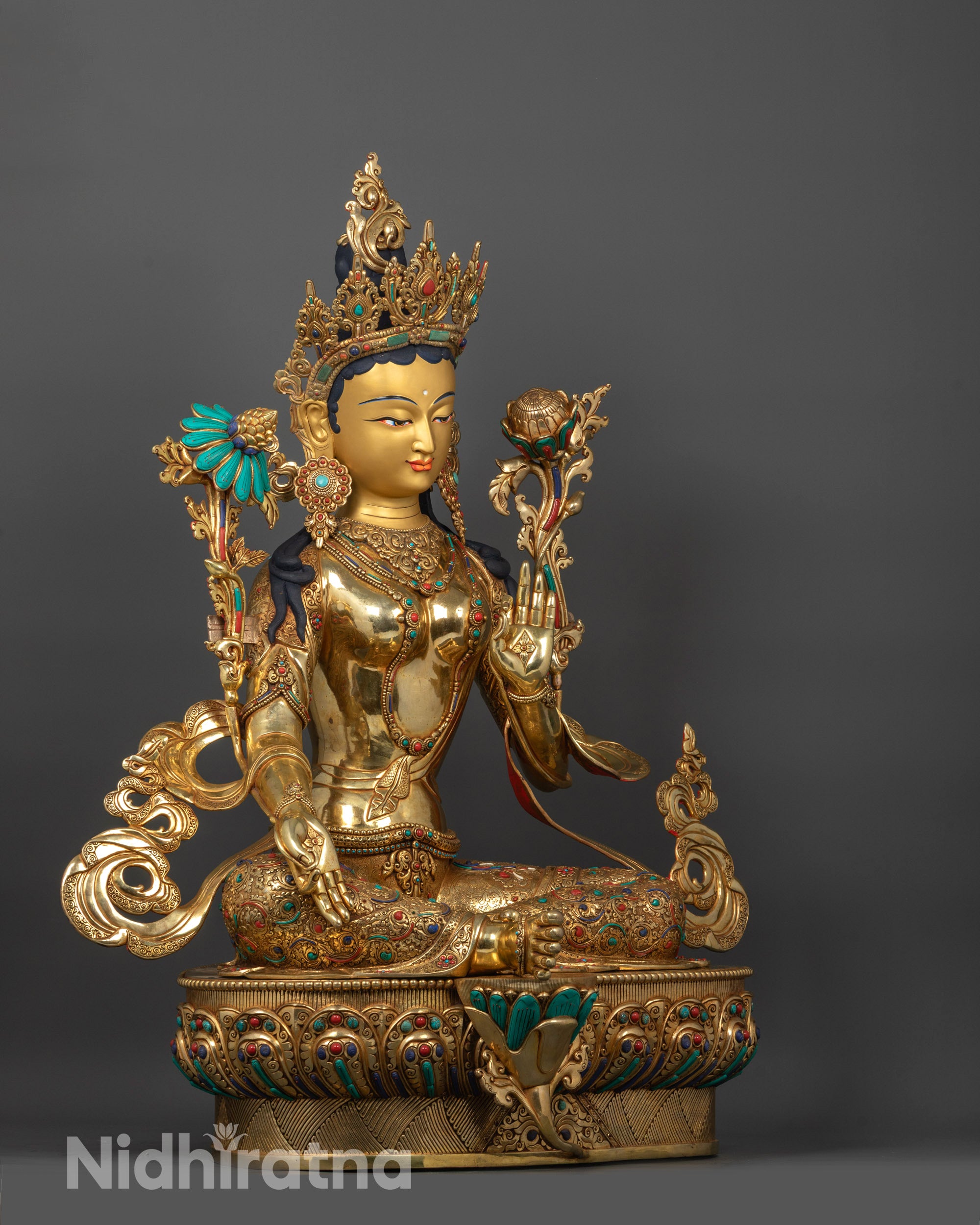 Side view of traditional Green Tara Sculpture made in Nepal using lost-wax method