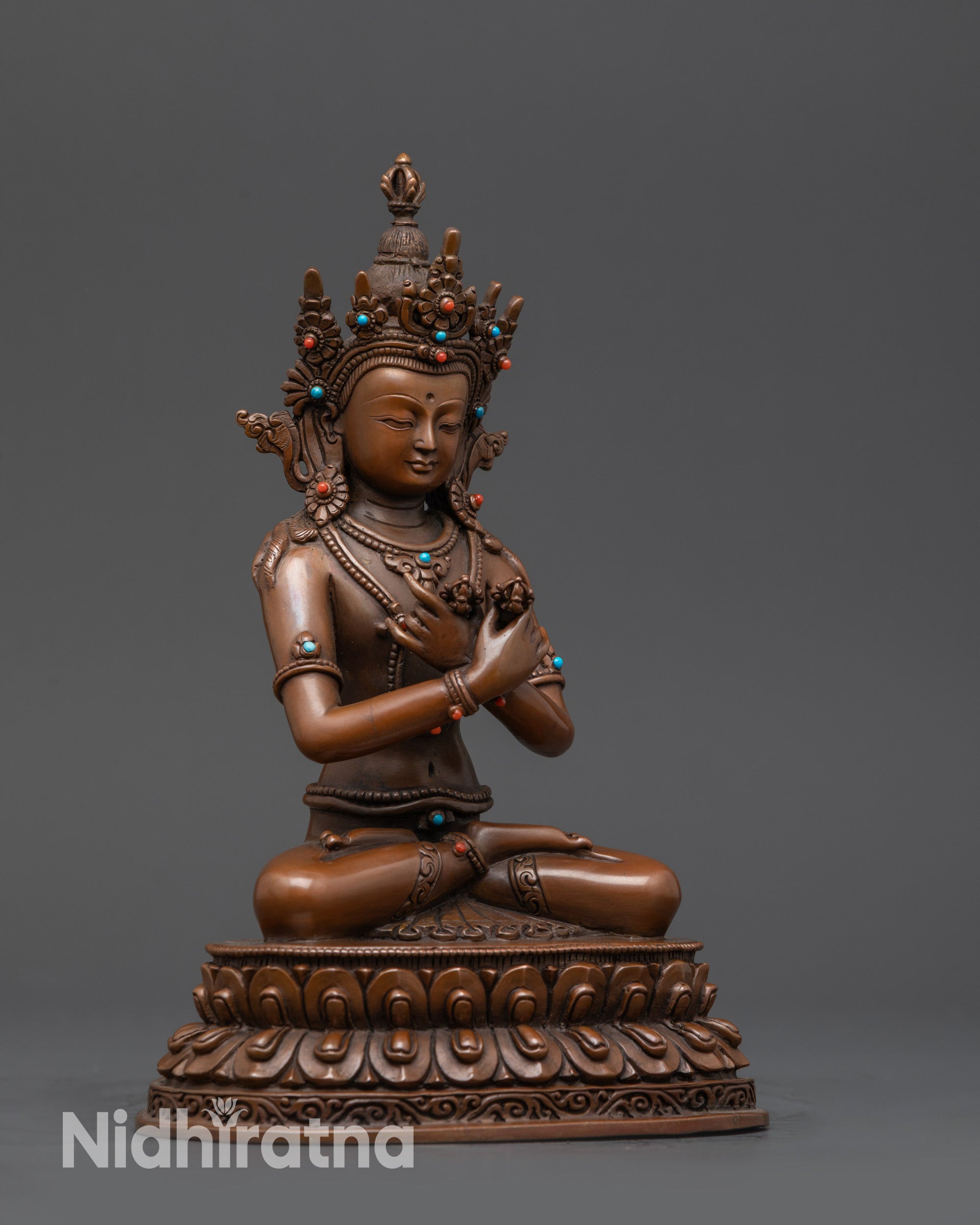 Side view oxidized Vajradhara Buddha statue on double-layered lotus seat