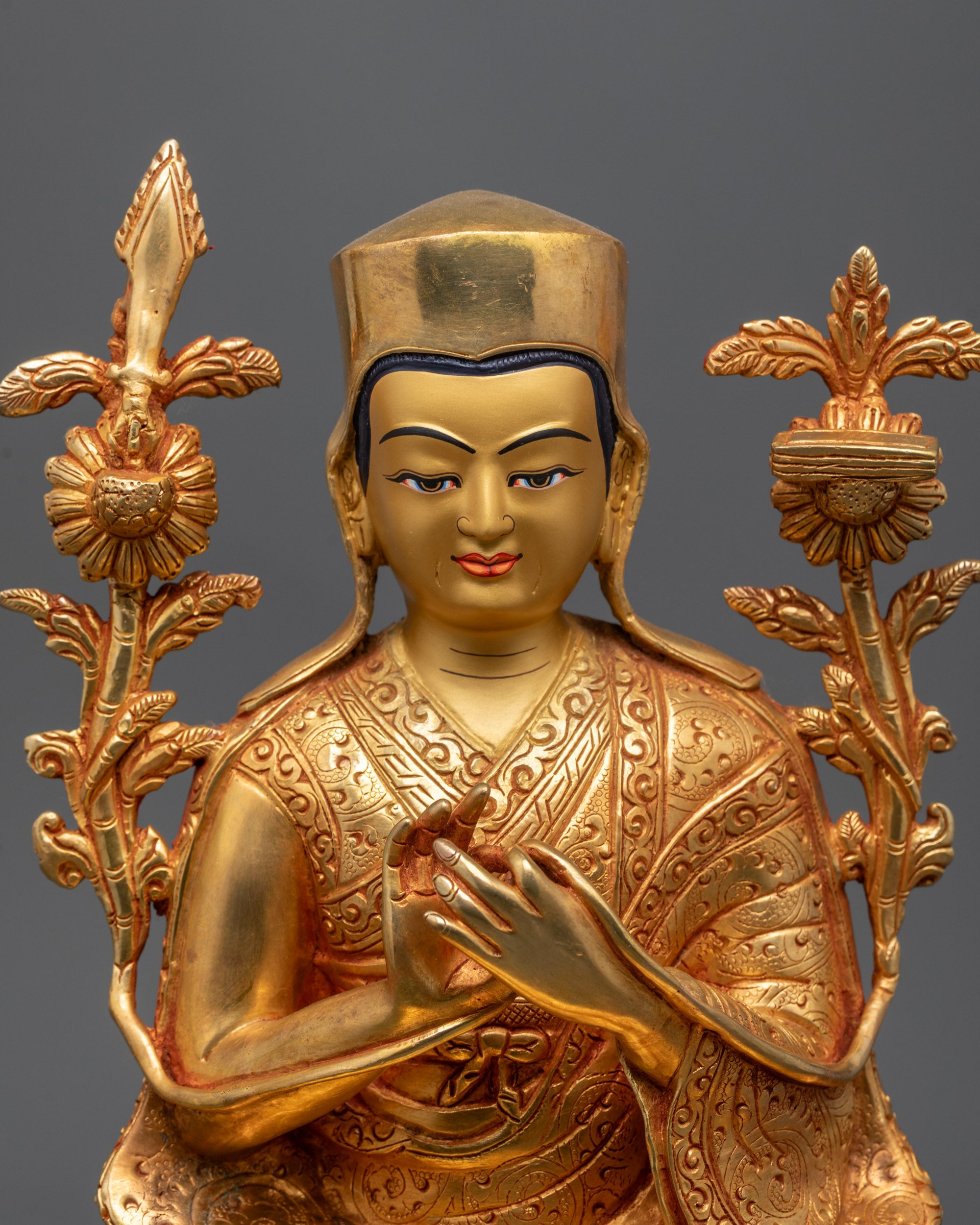 Sonam Tsemo statue forming the turning-of-the-wheel mudra