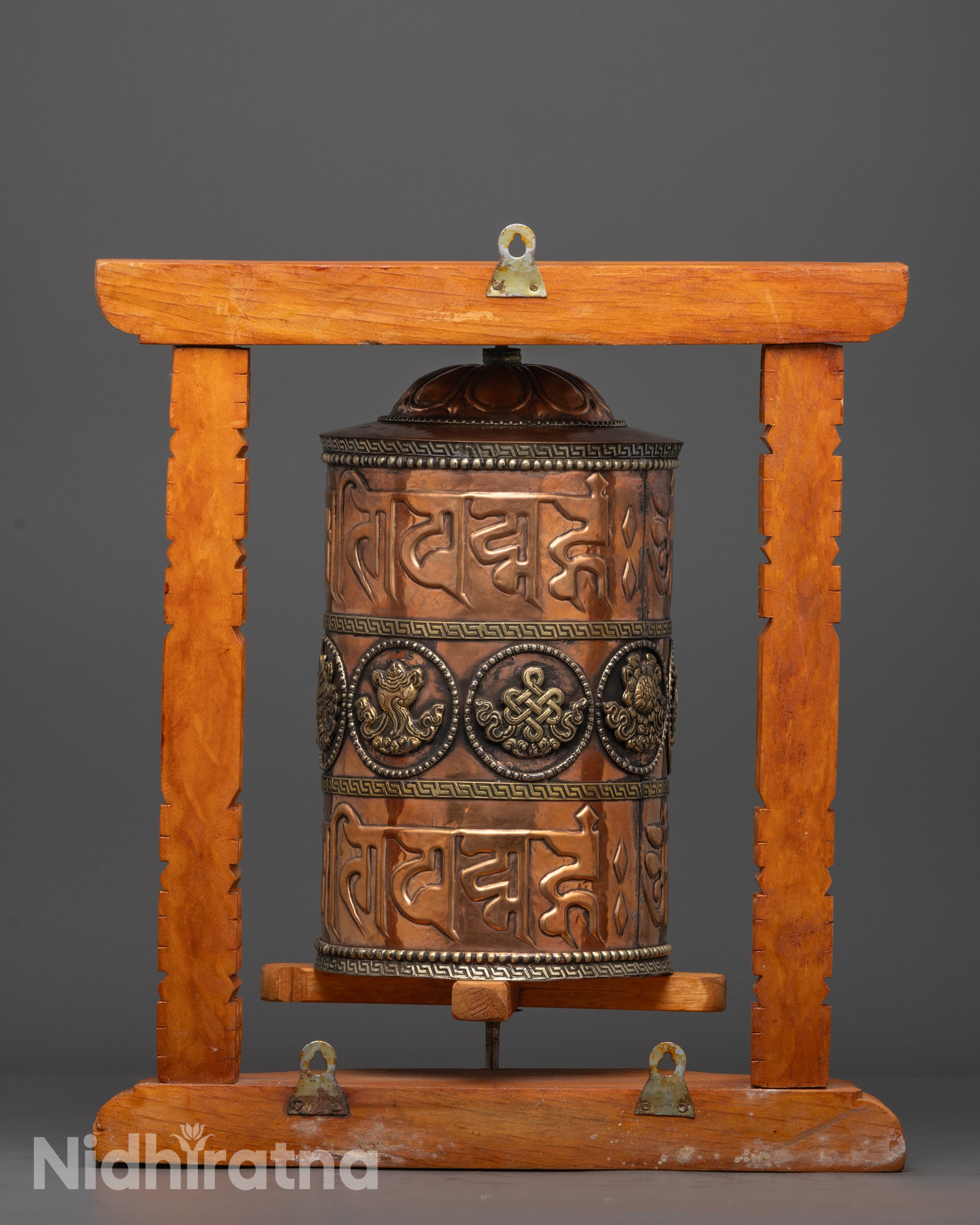 Spiritual Tibetan Prayer Wheel with copper, brass finish, and carved wooden frame