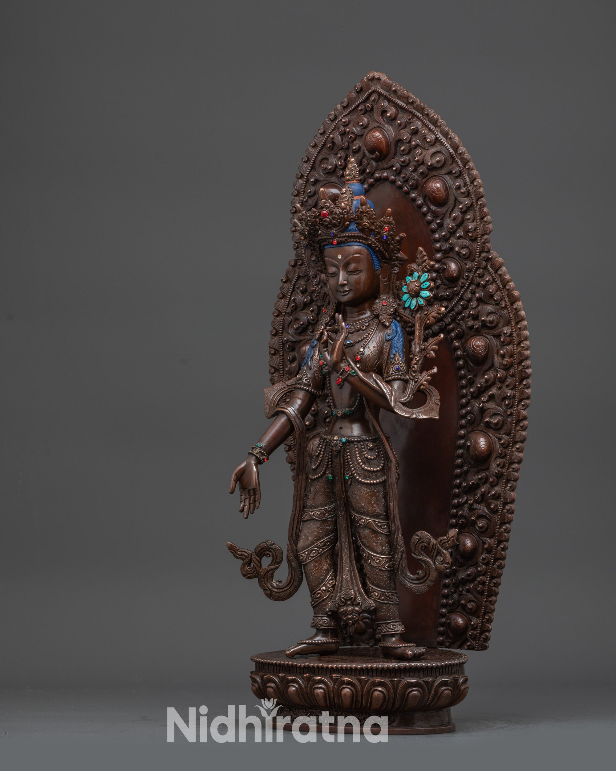 Standing Chenrezig holding Utpala flower oxidized copper compassion bodhisattva statue