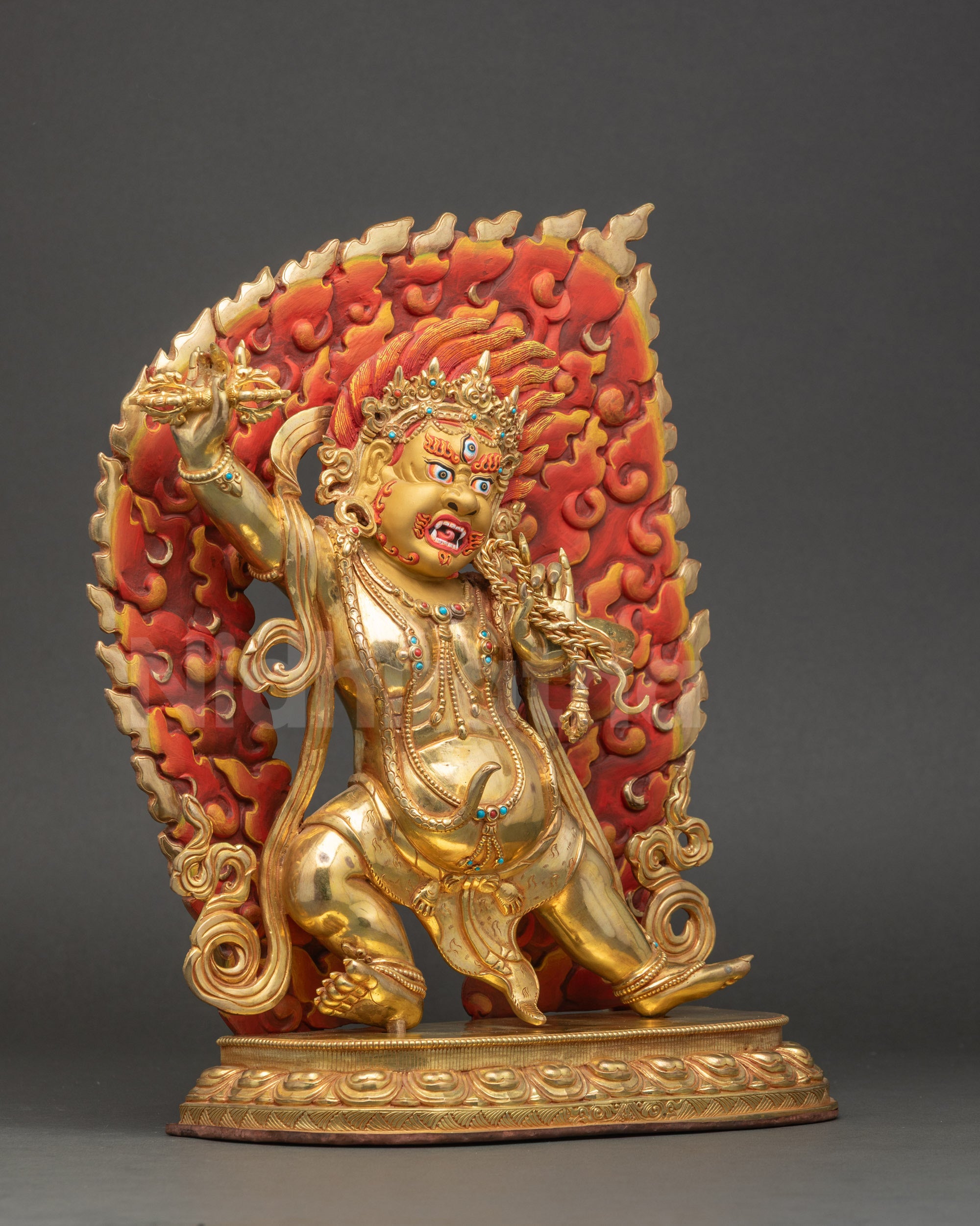 Standing Vajrapani holding vajra and robe, adorned with semi-precious stones