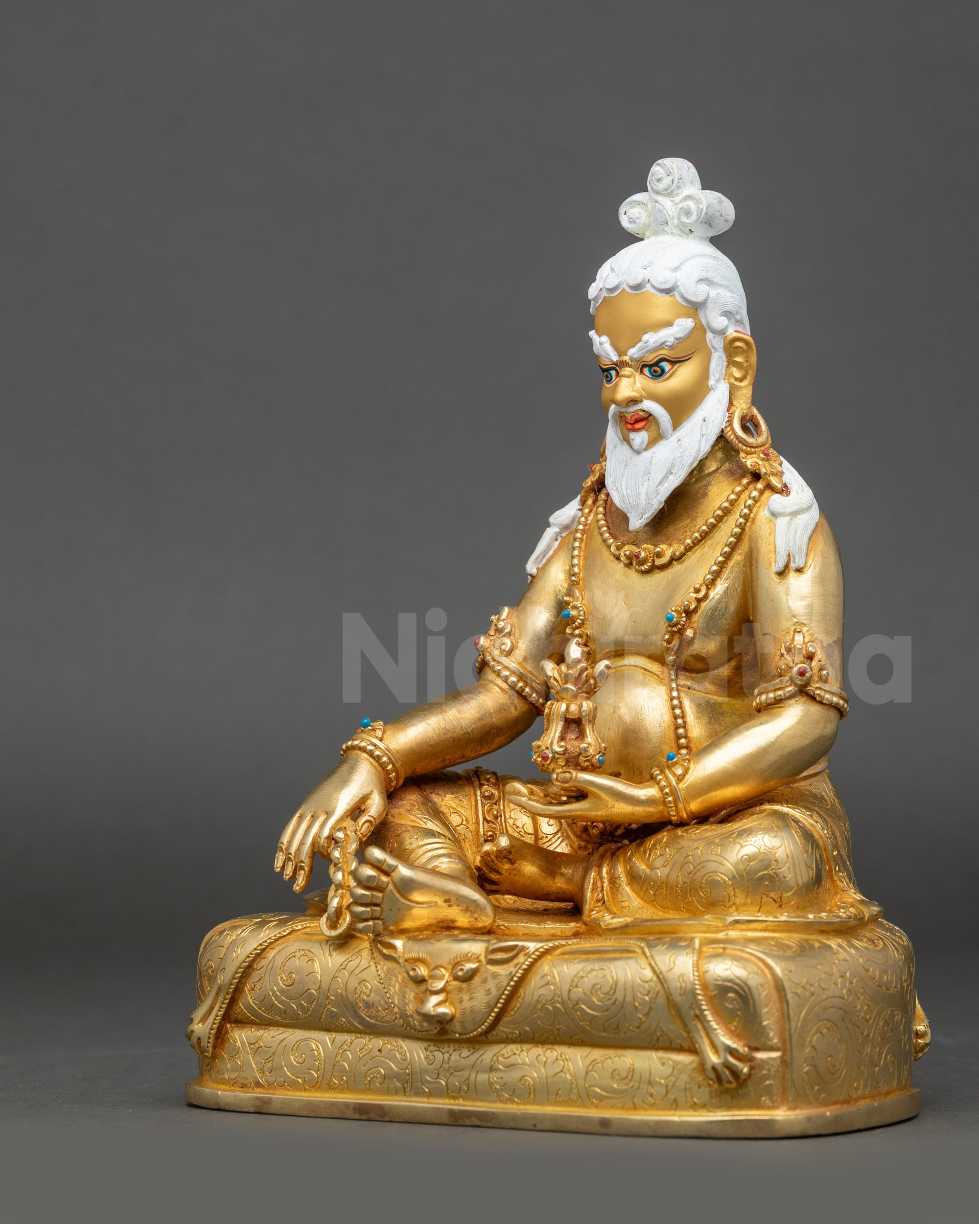 Thangtong Gyalpo statue left side view handcrafted Nepalese gold-gilded art