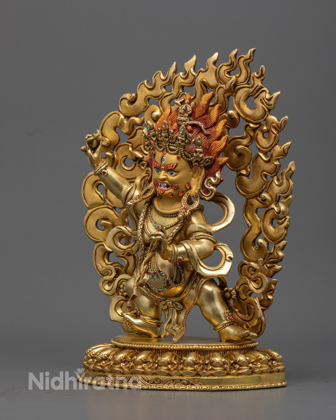 The Bodhisattva of Power, standing amidst swirling energy, a beacon of fearlessness and divine protection.