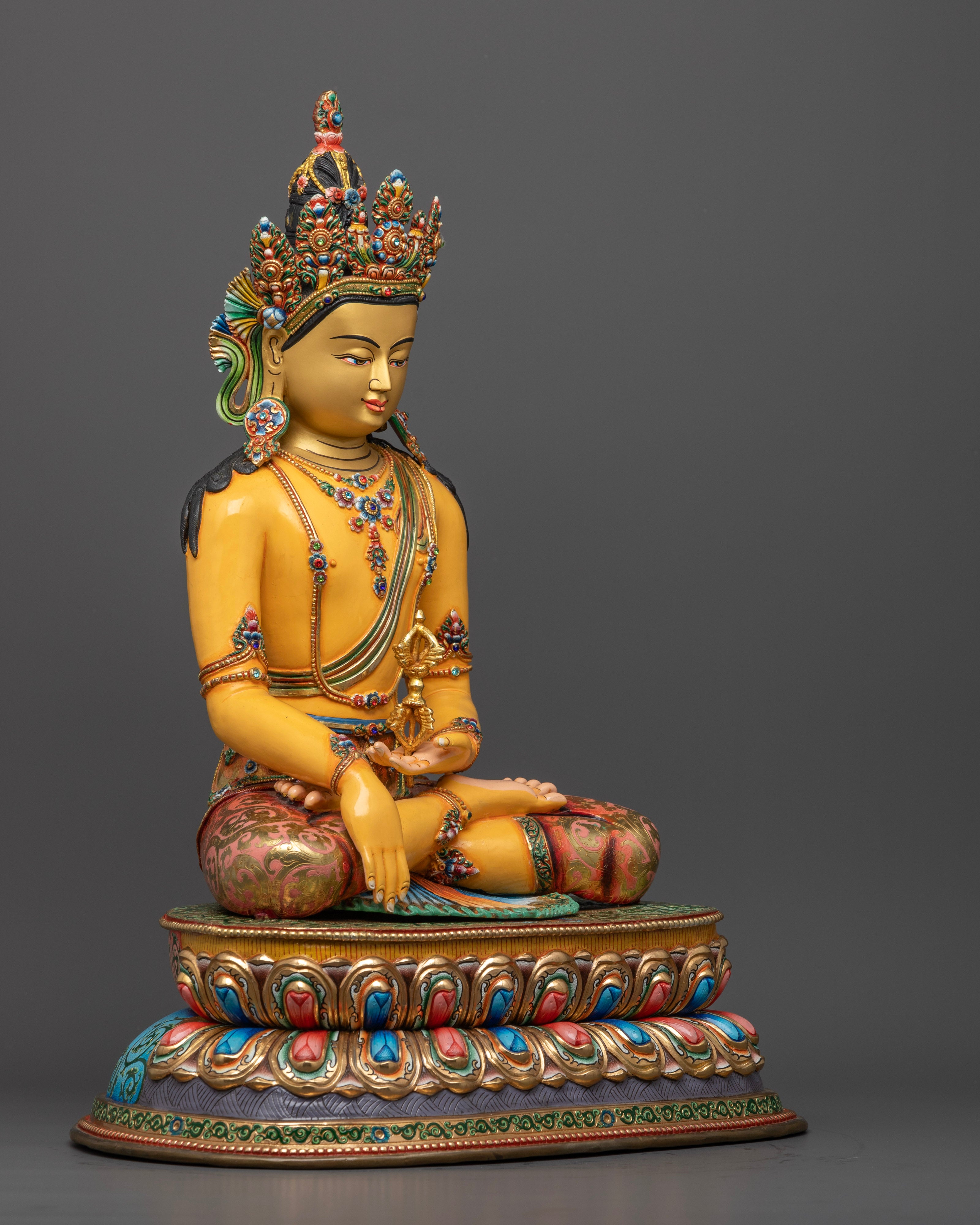 The Mitrugpa statue showcasing intricate patterns, rich acrylic colorwork, and the fine textures crafted by skilled Patan artisans.