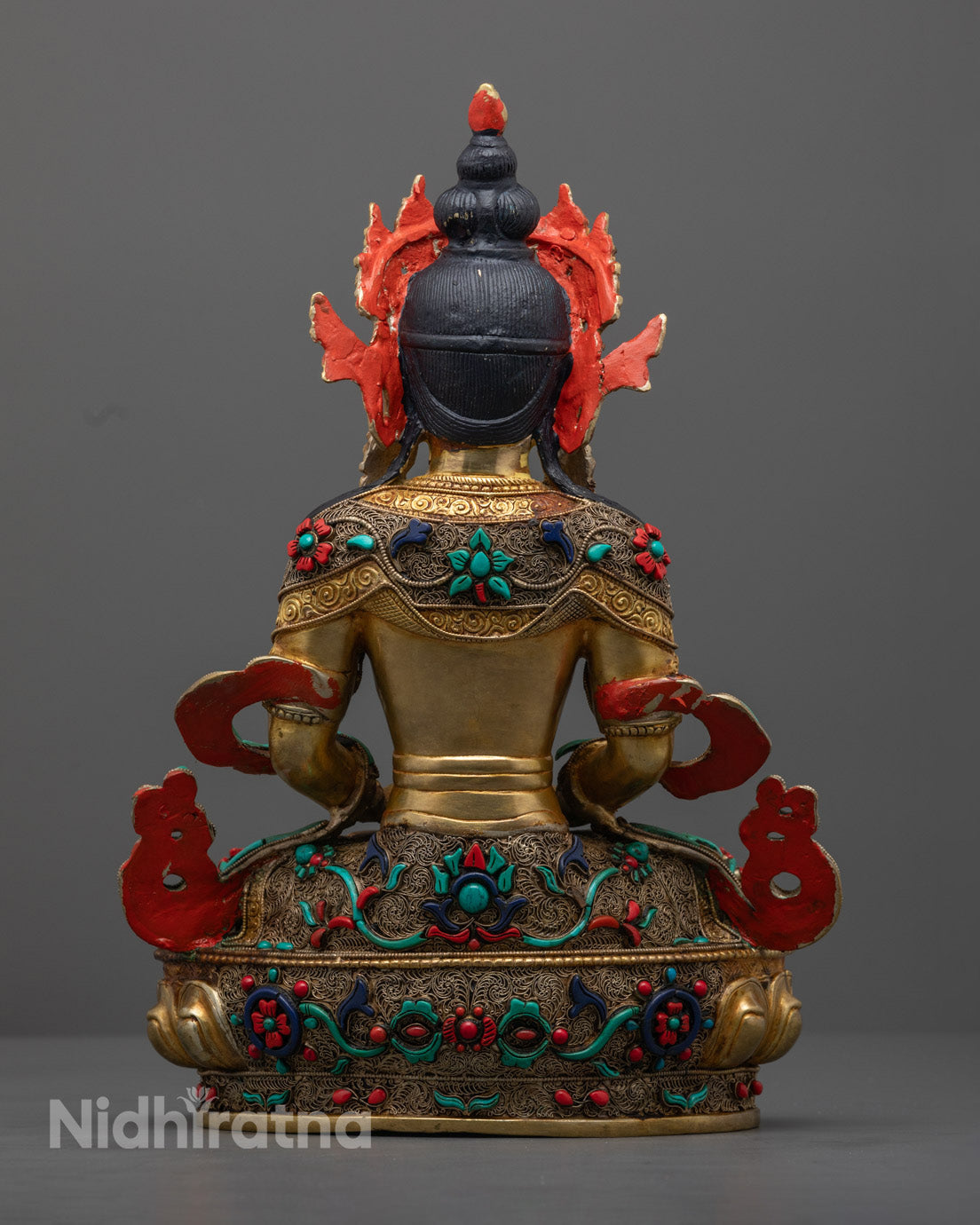 Tibetan Amitayus Buddha Statue showcasing its timeless artistry, the hollow section for filing with sacred offerings, and its tranquil, spiritual presence in any setting