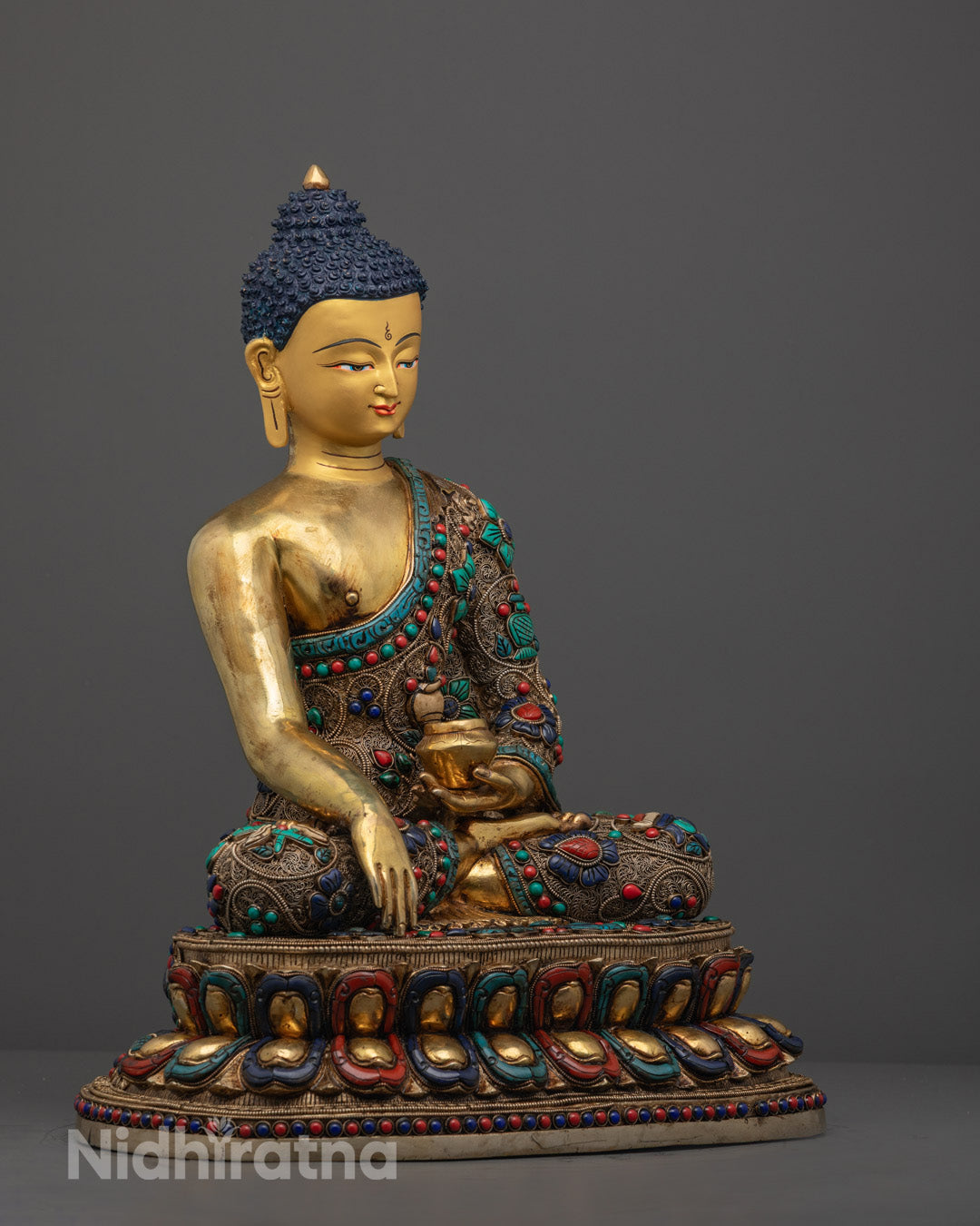 Tibetan Shakyamuni Buddha Statue made using the lost wax method, embellished with semi-precious stones and rich symbolic details