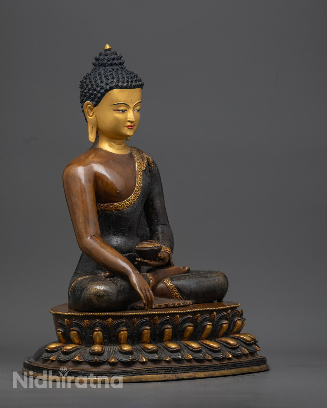 Intricately Carved Gold-Plated Robe on Oxidized Copper Buddha Statue
