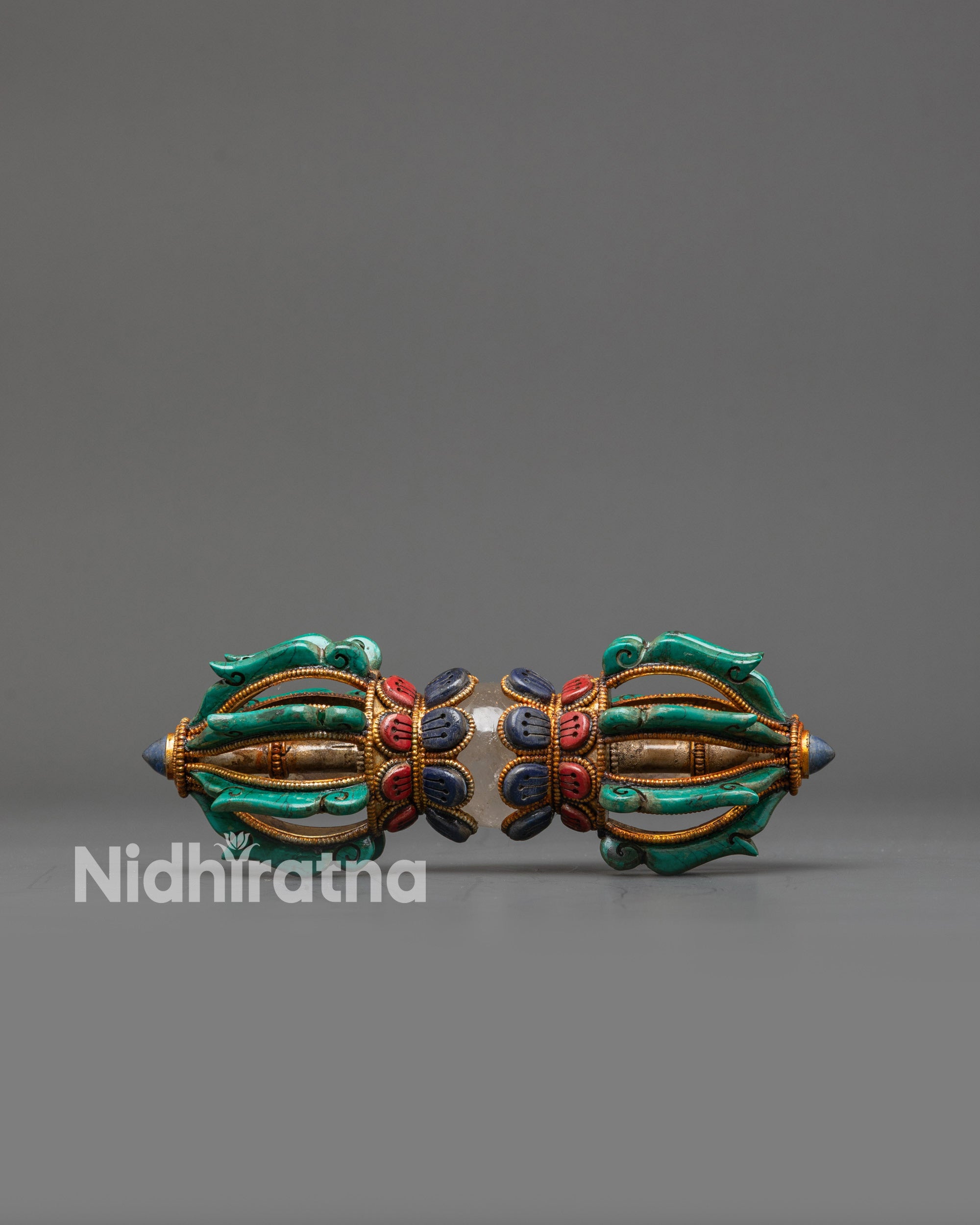 Tibetan Vajra dorje handcrafted from copper with turquoise, coral, and lapis inlays