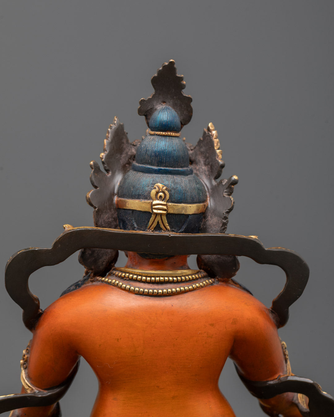 Top-down view of Dzambhala Sculpture showing moon disc base and hollow section for mantras