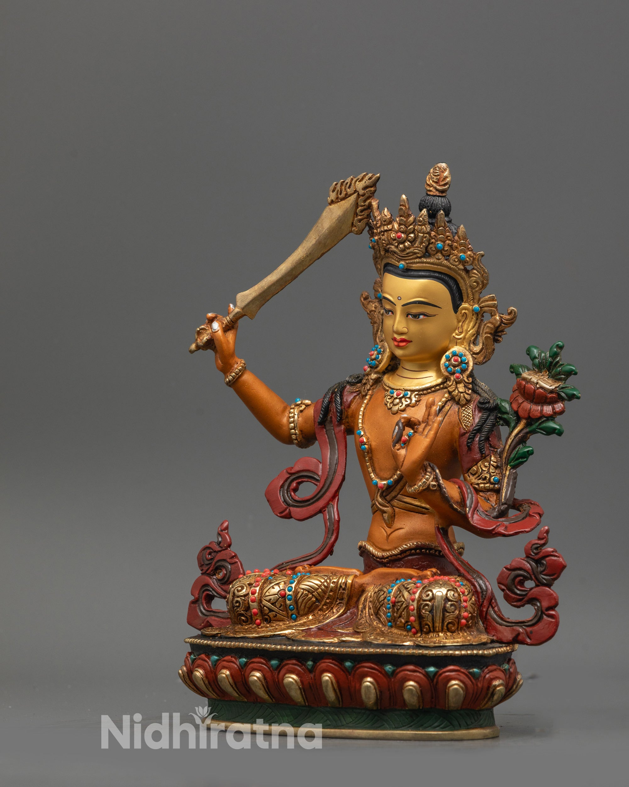 Traditional Lost Wax Method Manjushri Statue with vibrant orange body