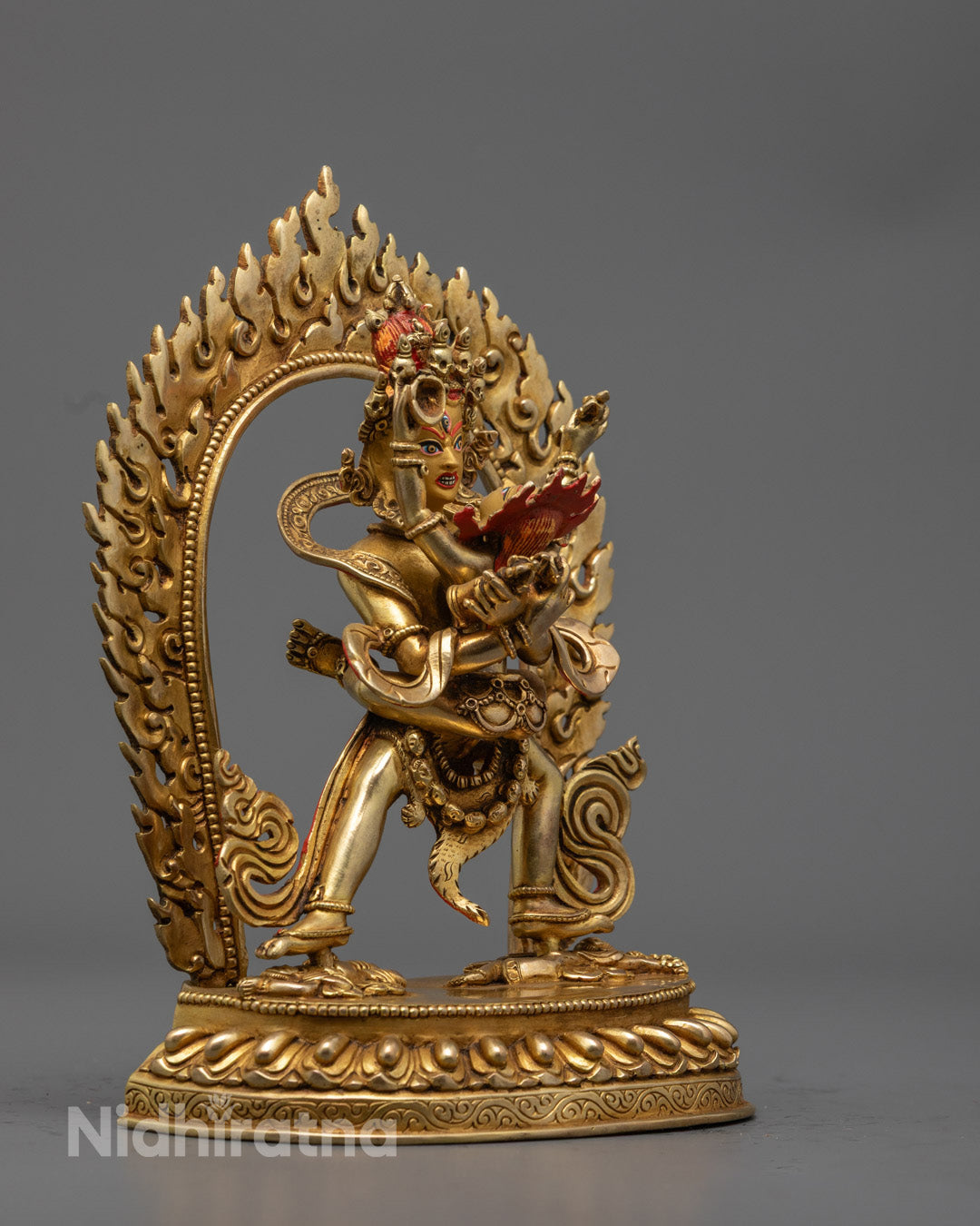 Traditional Tibetan Buddhist Chakrasamvara statue seated on lotus throne with symbolic elements