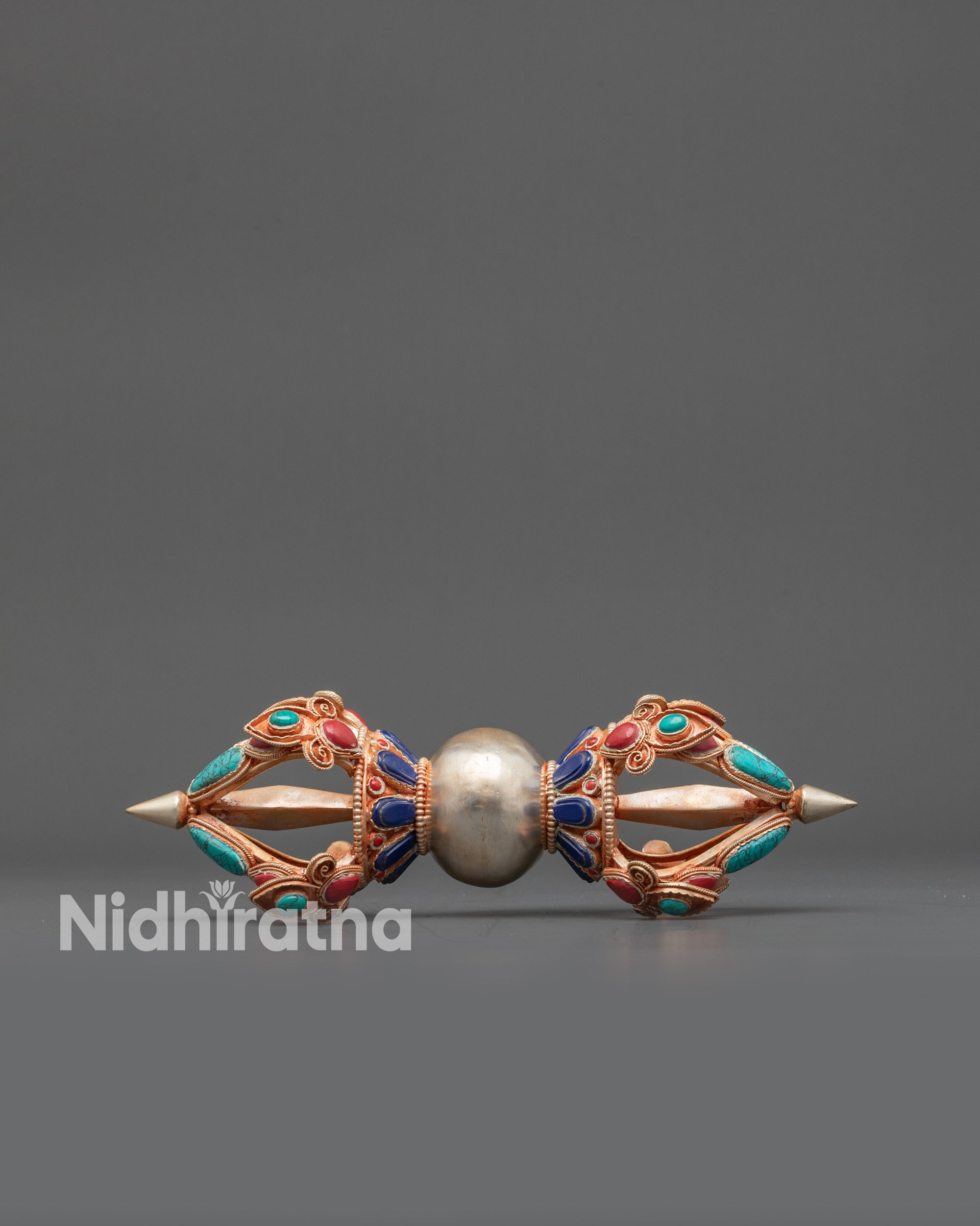 Traditional Tibetan Vajra with turquoise, coral, and lapis inlays for meditation