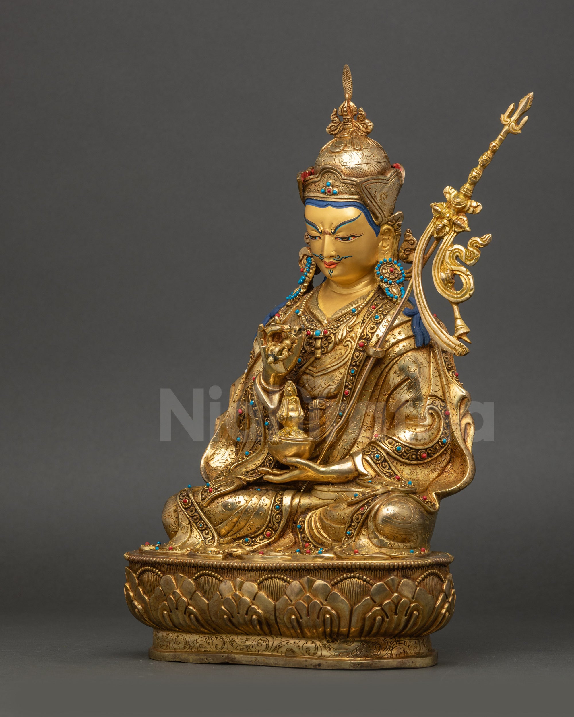 Tsokye Dorje Statue left side view gold-gilded face and detailed robes