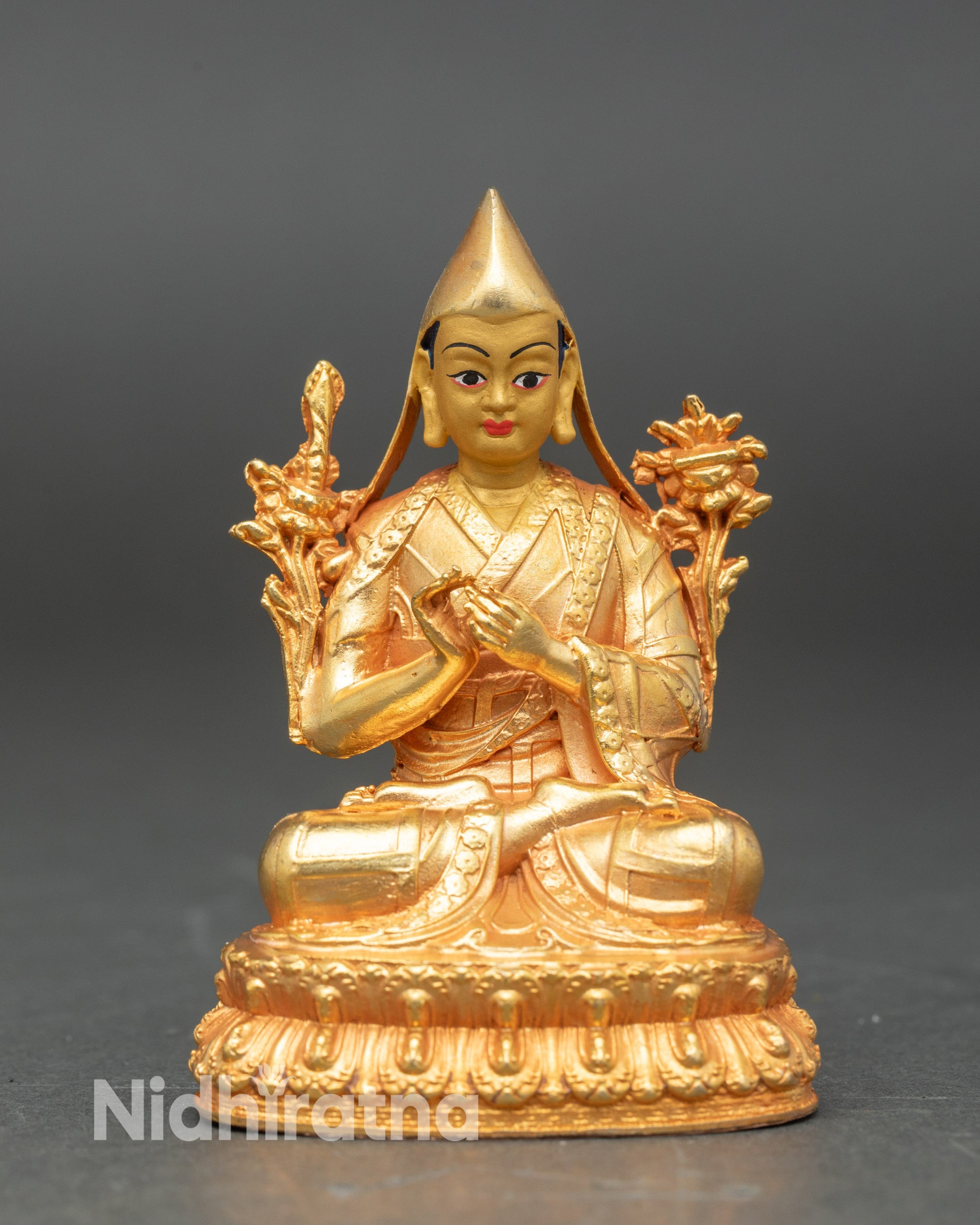 Shakya Pandit statue with radiant gold-painted face and 24K fire-gilded finish