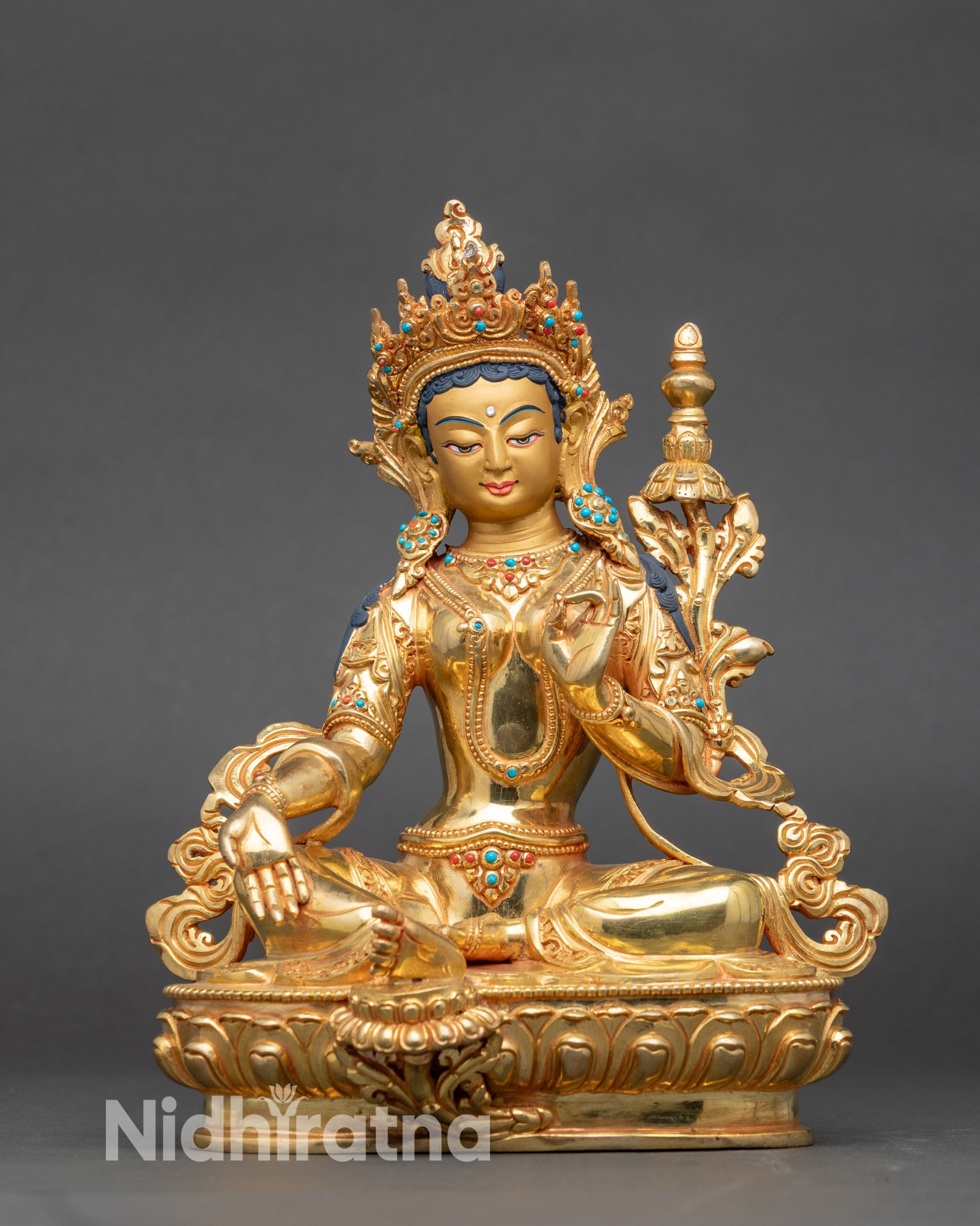 Tsugtor Namgyalma detailed side close up, showing symbolic hand gestures and posture