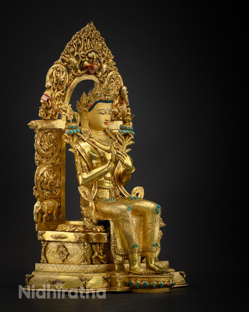 Maitreya Buddha statue performing Dharmachakra Mudra, symbolizing the turning of the wheel of Dharma, seated on a decorated pedestal.