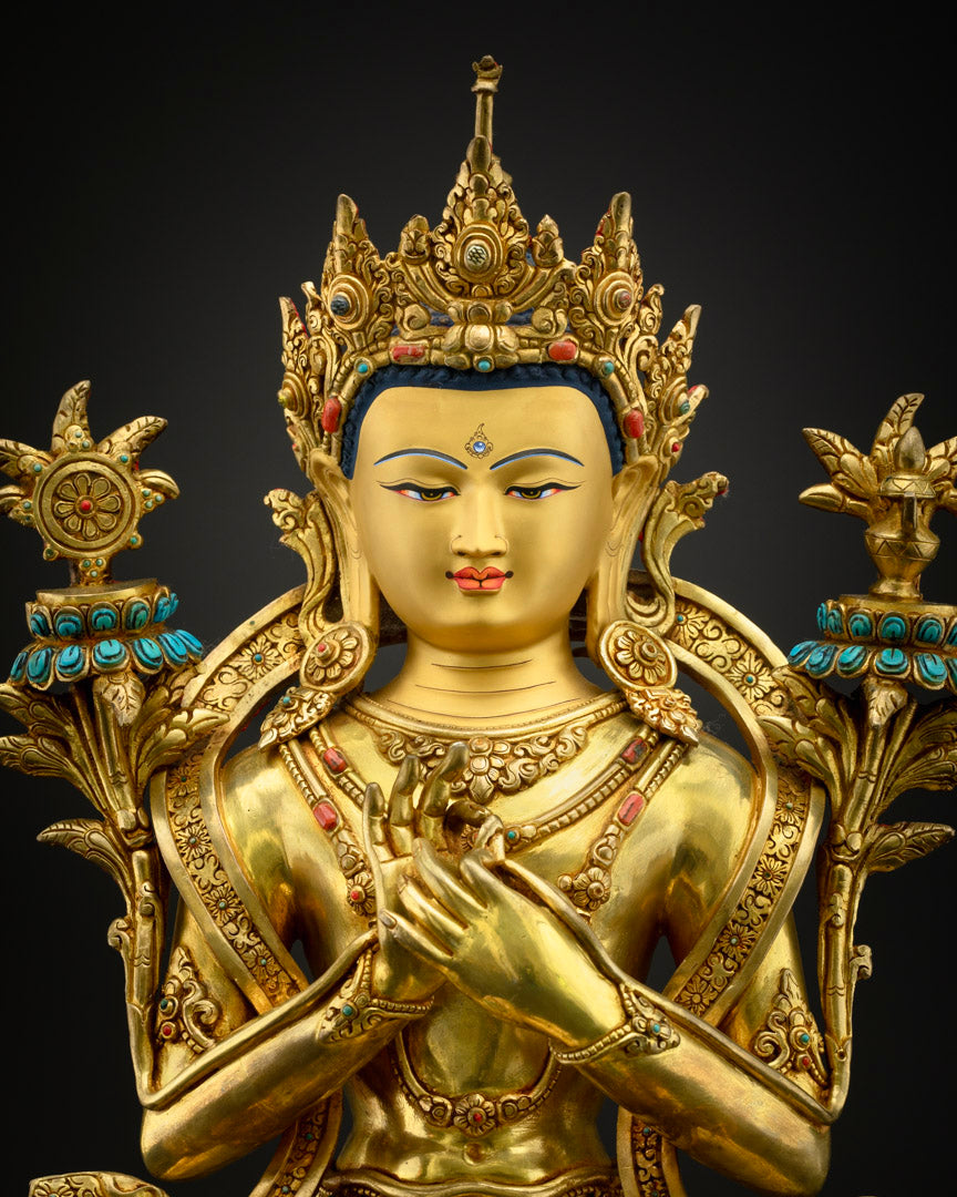 Maitreya Buddha’s serene face and detailed crown, showcasing intricate gold work and embedded Lapis Lazuli gemstones.