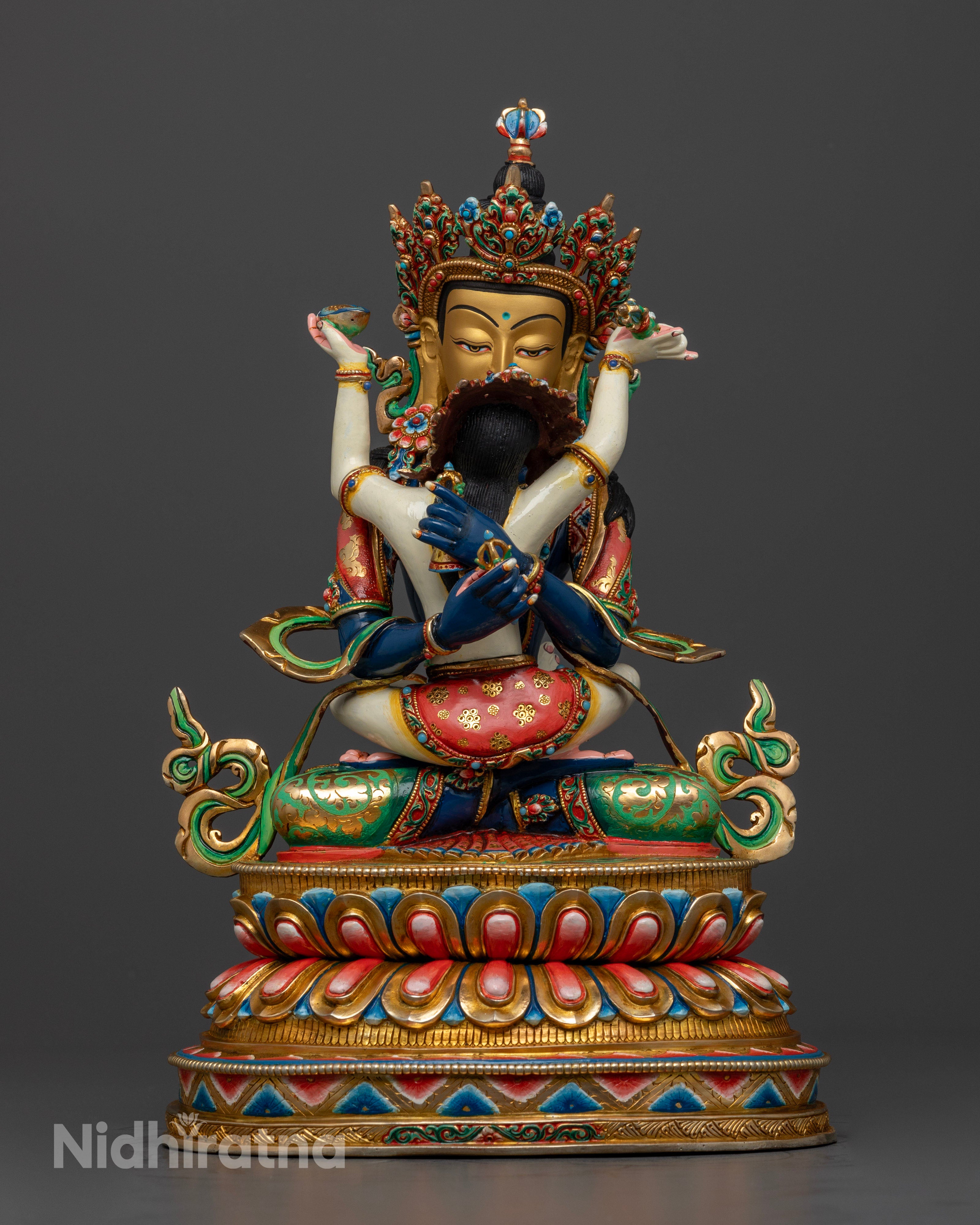 Vajradhara’s serene face and crossed vajra gesture, highlighting the masterful craftsmanship and radiant expression of ultimate wisdom and compassion.