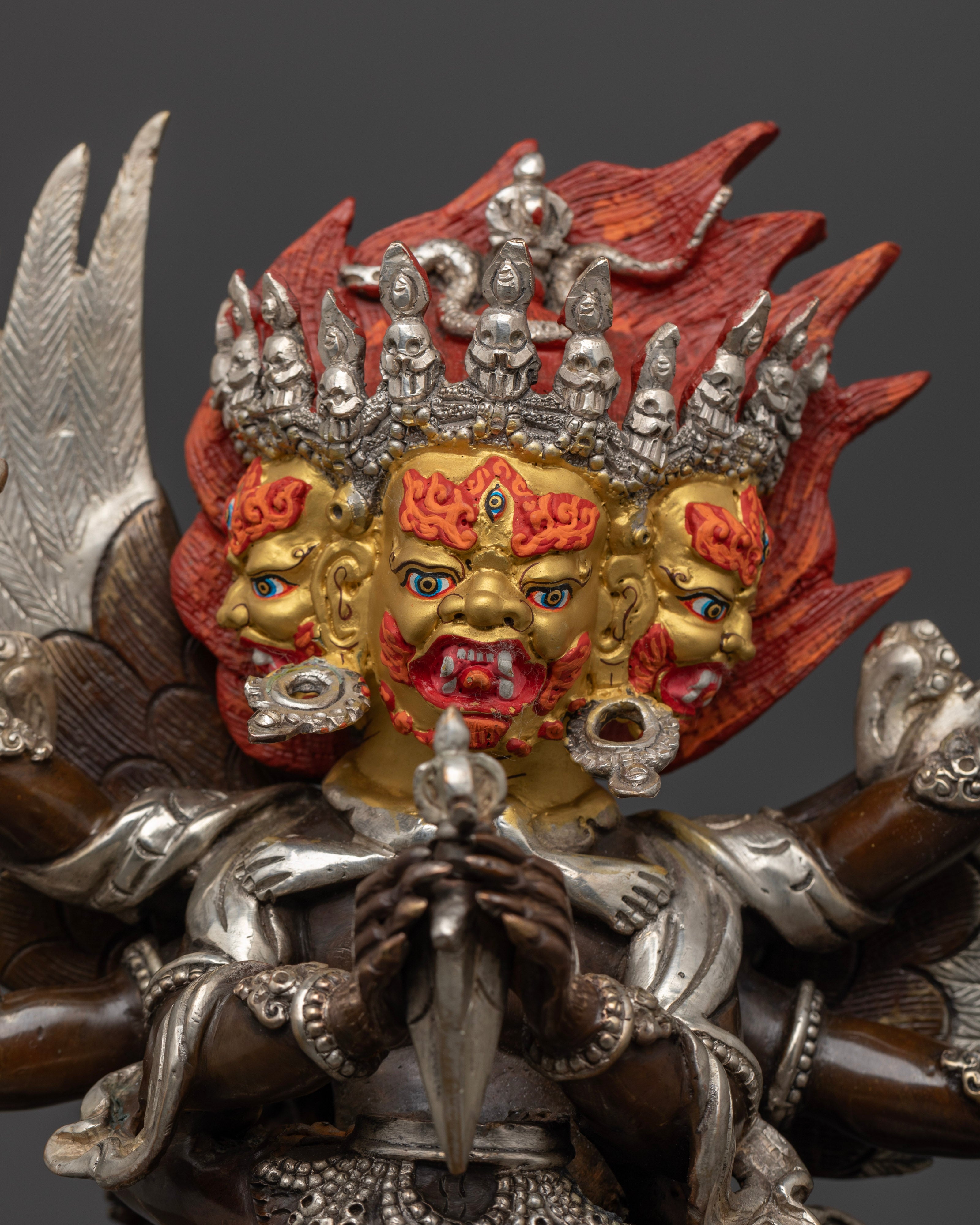 Vajrakilaya’s fierce expression and detailed vajra crown, highlighting the intricate craftsmanship symbolizing the deity’s power to eliminate obstacles and purify negative energies.