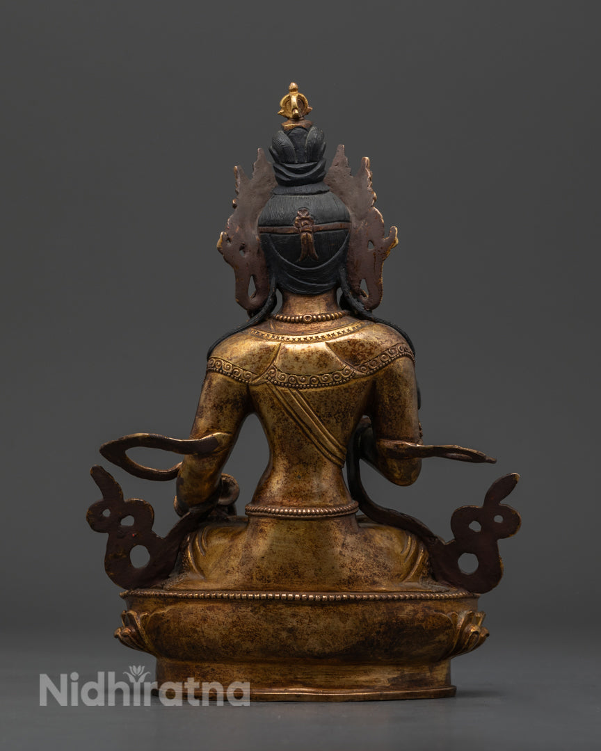 Back view of a 24k gold gilded Vajrasattva statue, showcasing intricate carvings, turquoise and coral inlays, and divine Buddhist artistry.