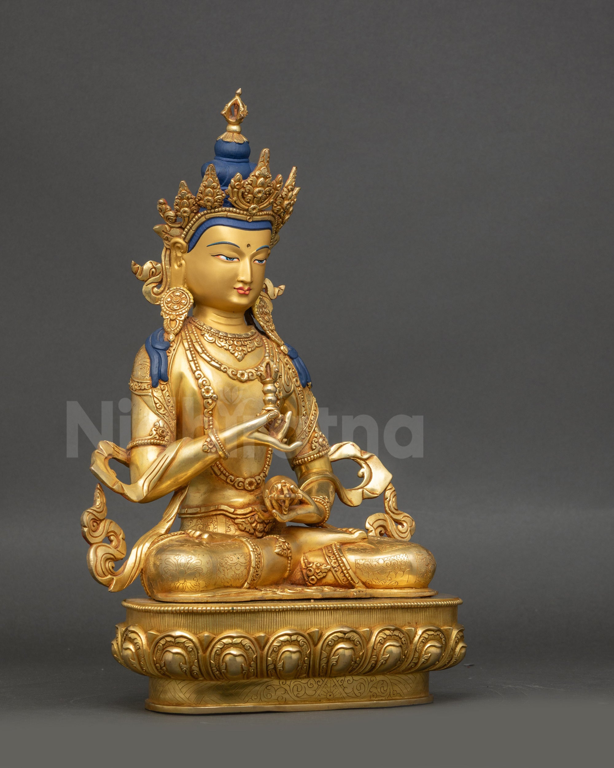 Vajrasattva Statue detailed side close up highlighting flowing robe and semi-precious stones