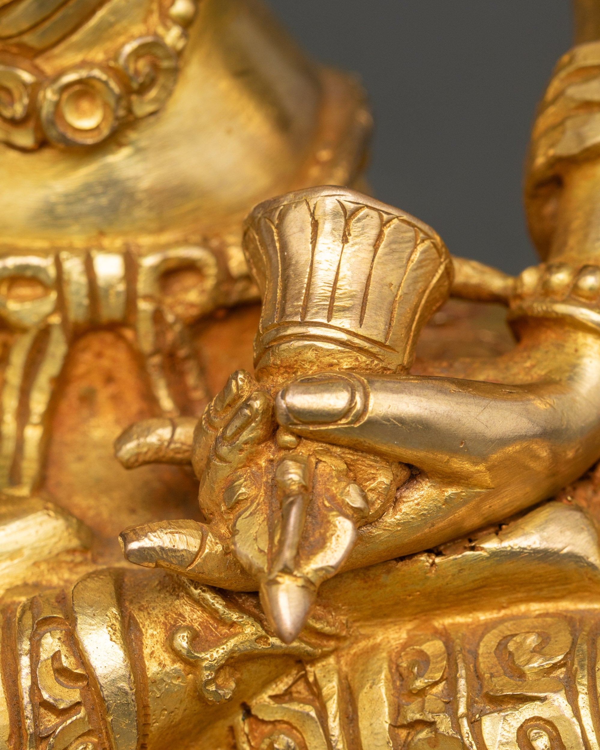 Vajrasattva holding vajra and bell, adorned with semi-precious stones