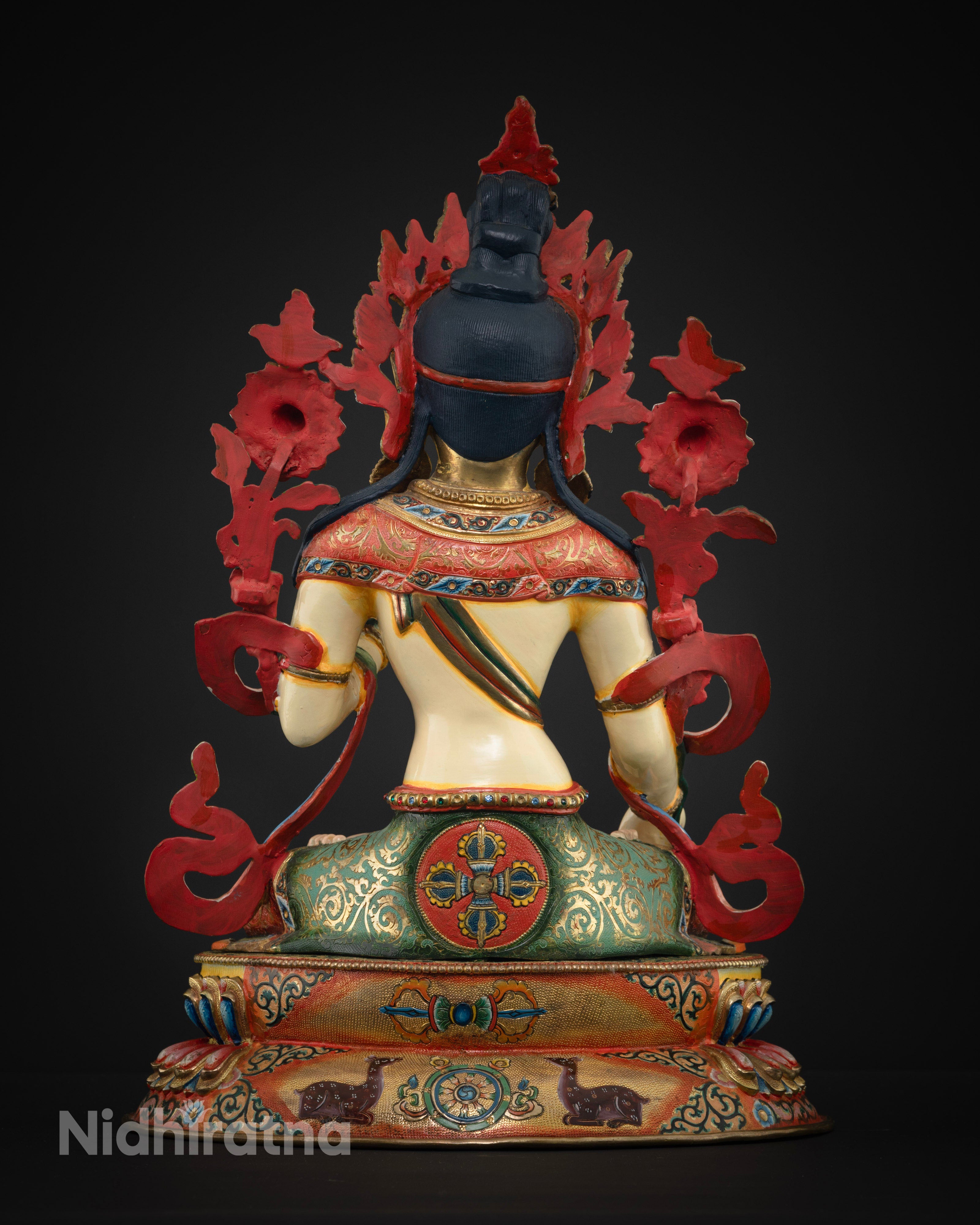 The White Tara statue seated on a colorful lotus pedestal, symbolizing serenity and spiritual grace, perfect for meditation spaces.