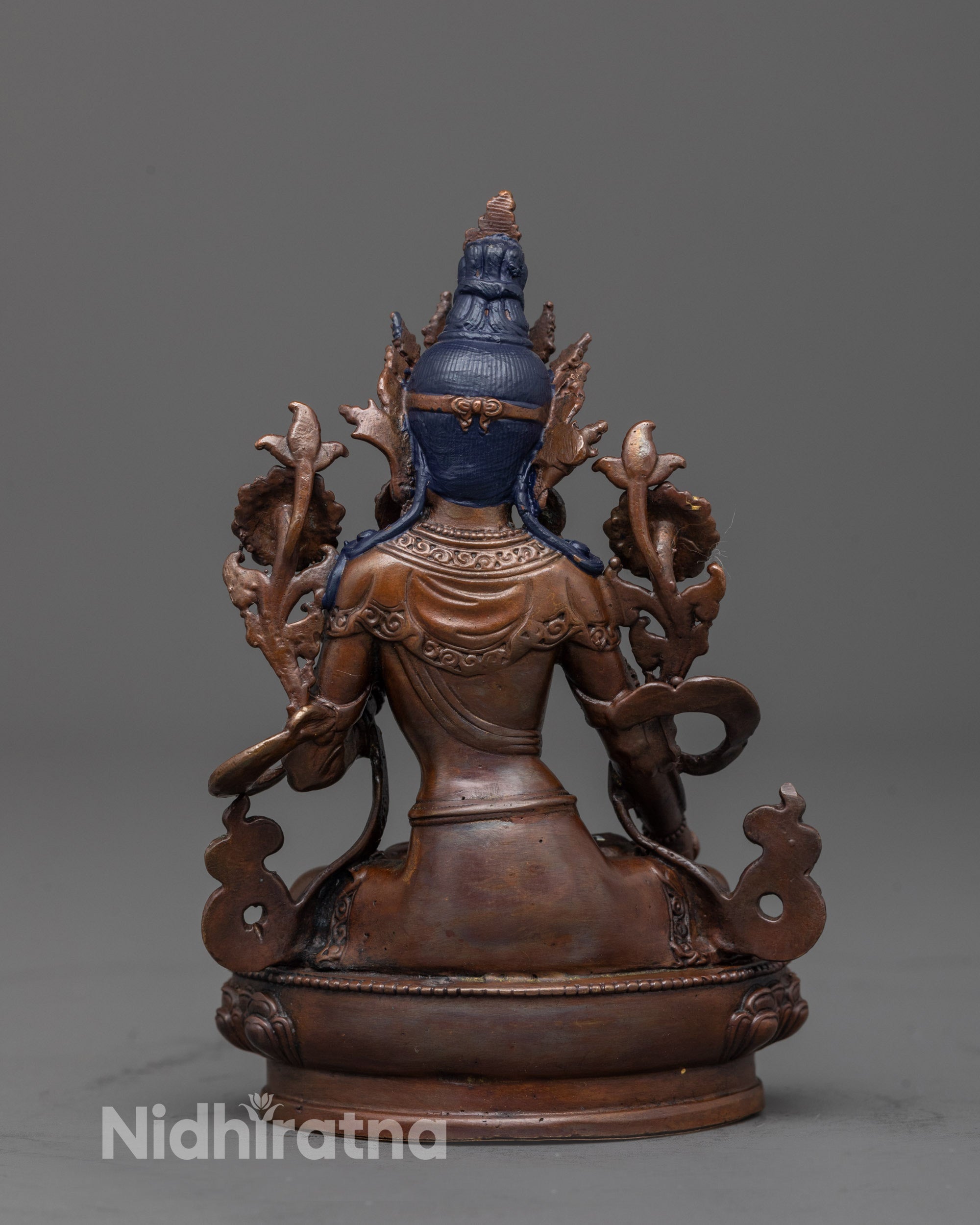 back view White Tara Statue with flowing robe design and oxidized copper earthy finish