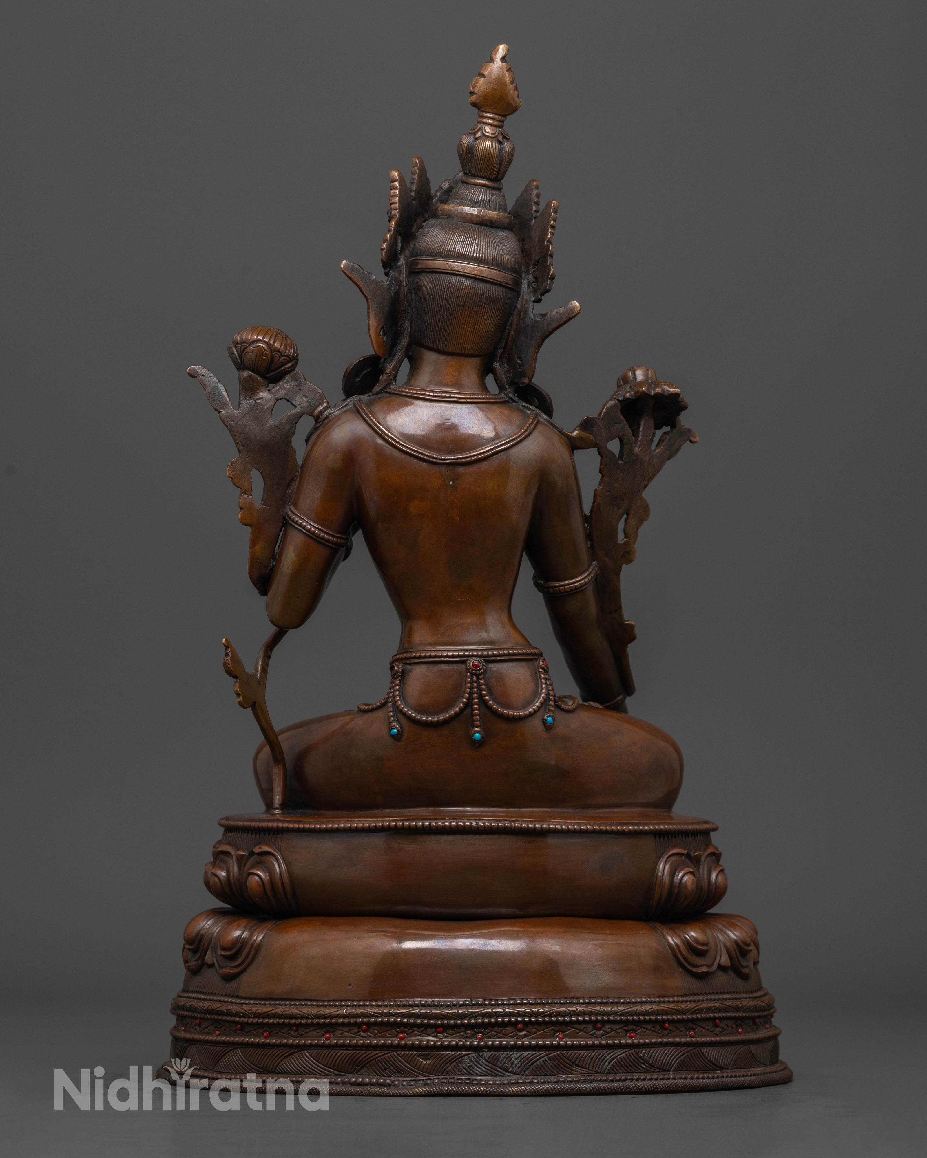 back profile of White Tara statue