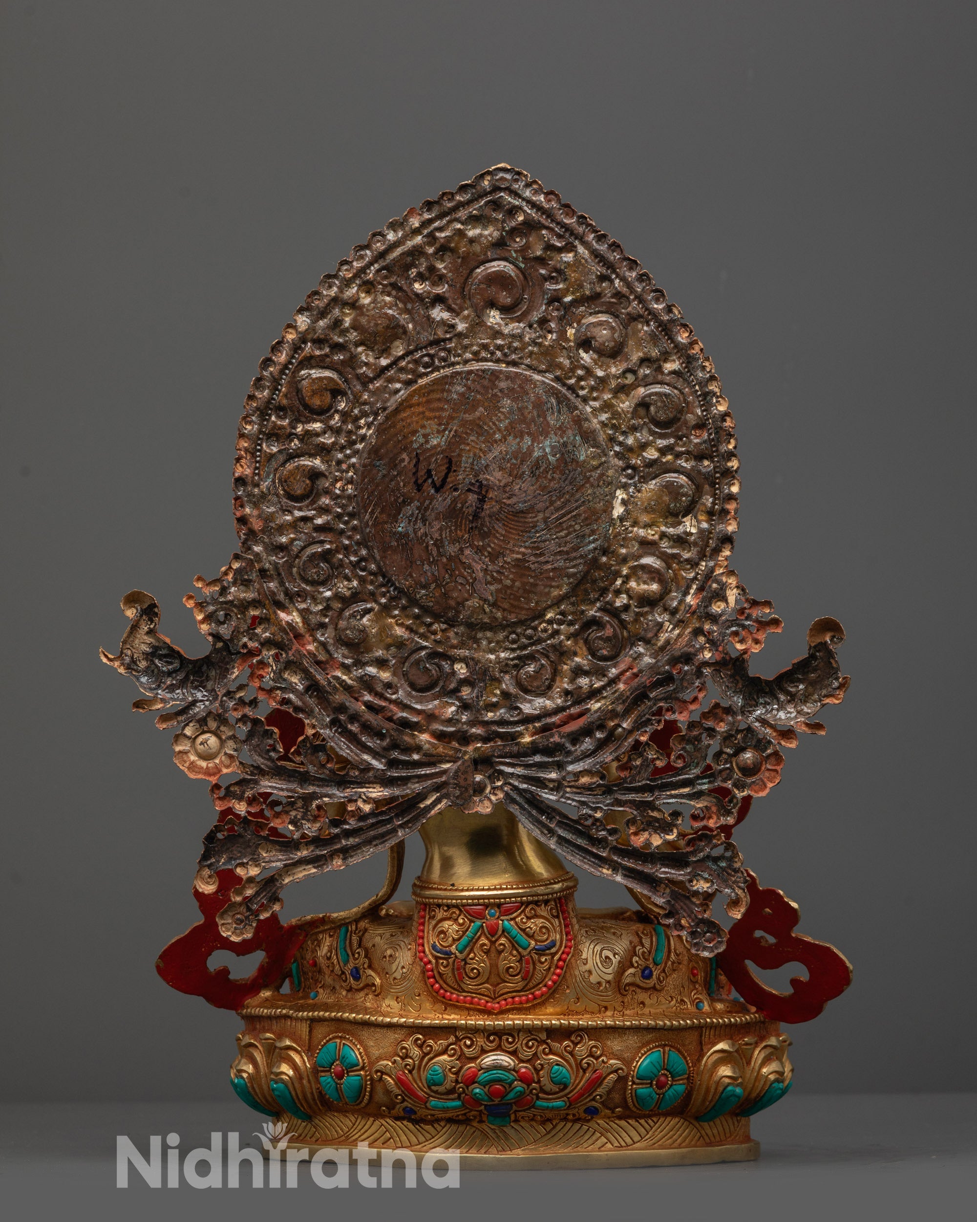 White Tara Copper-based statue with intricate detailing, luminous halo
