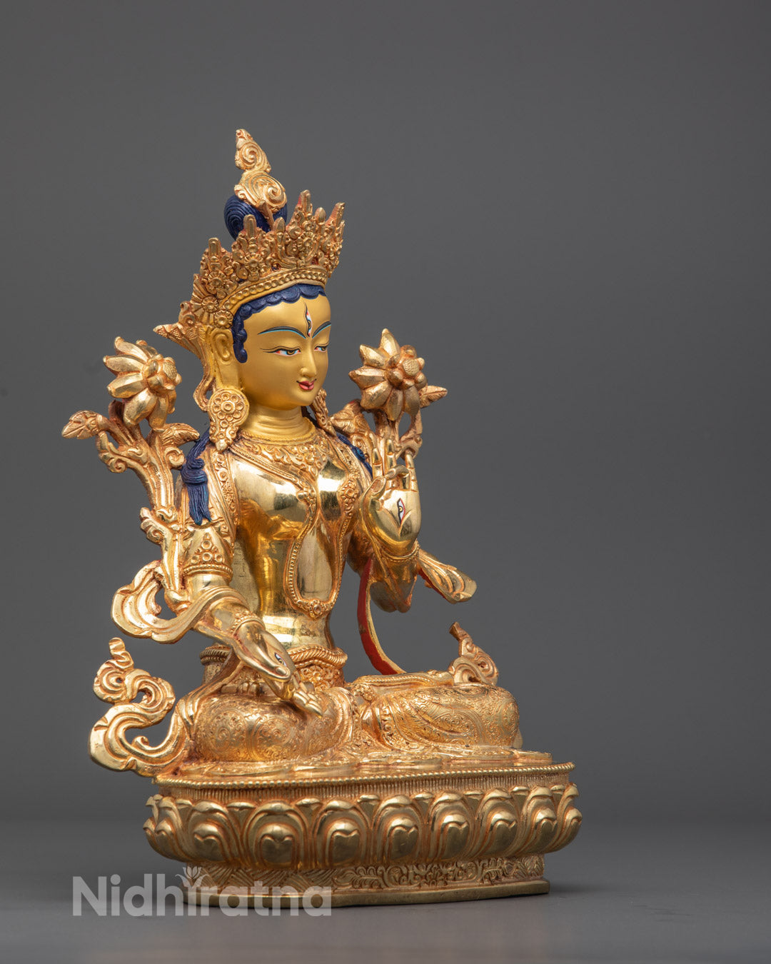 White Tara statue seated on lotus throne with hollow section for mantra and meditation, perfect for spiritual spaces