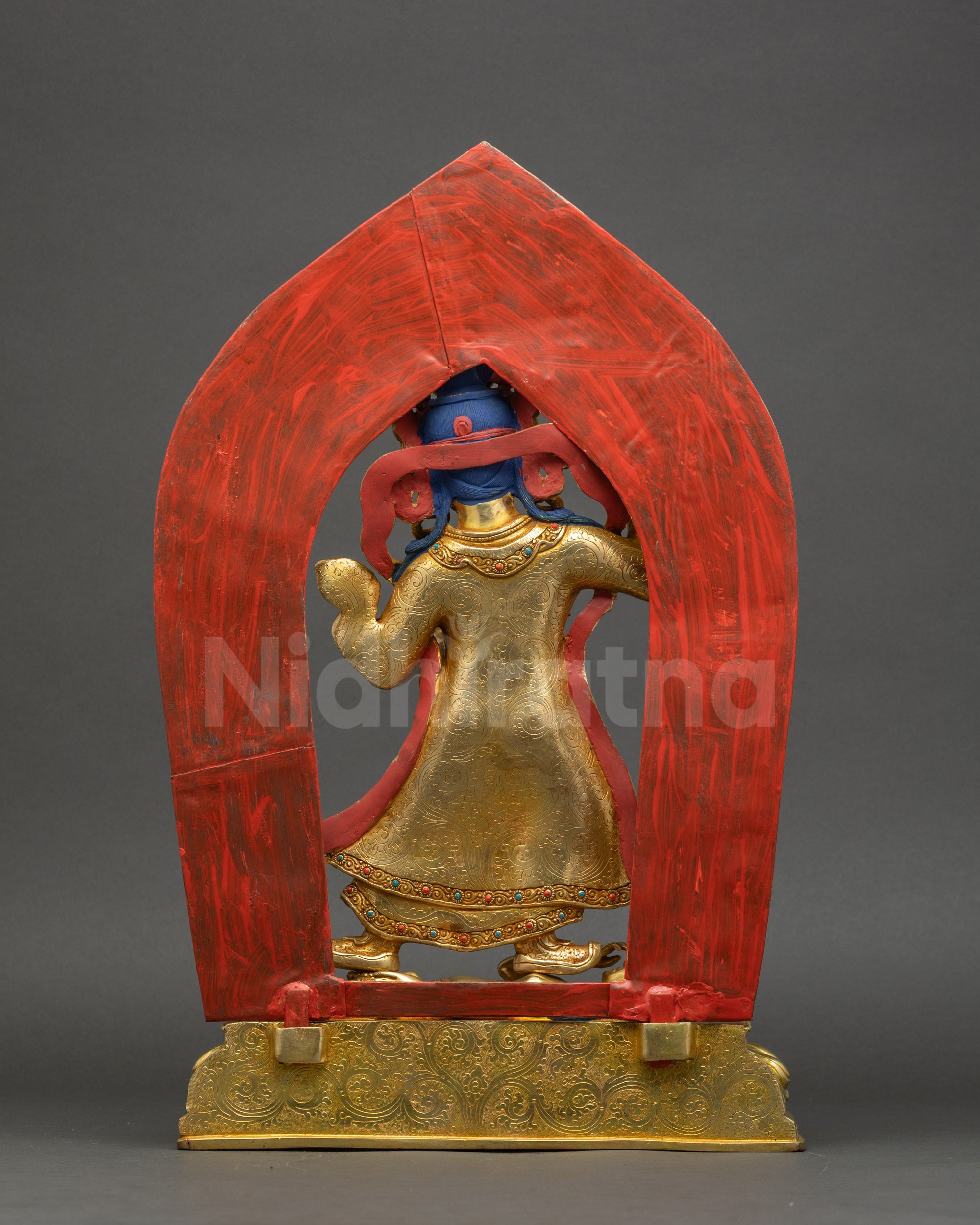 Achi Chokyi Drolma Buddhist statue with ornate aura halo and intricate Nepalese carvings
