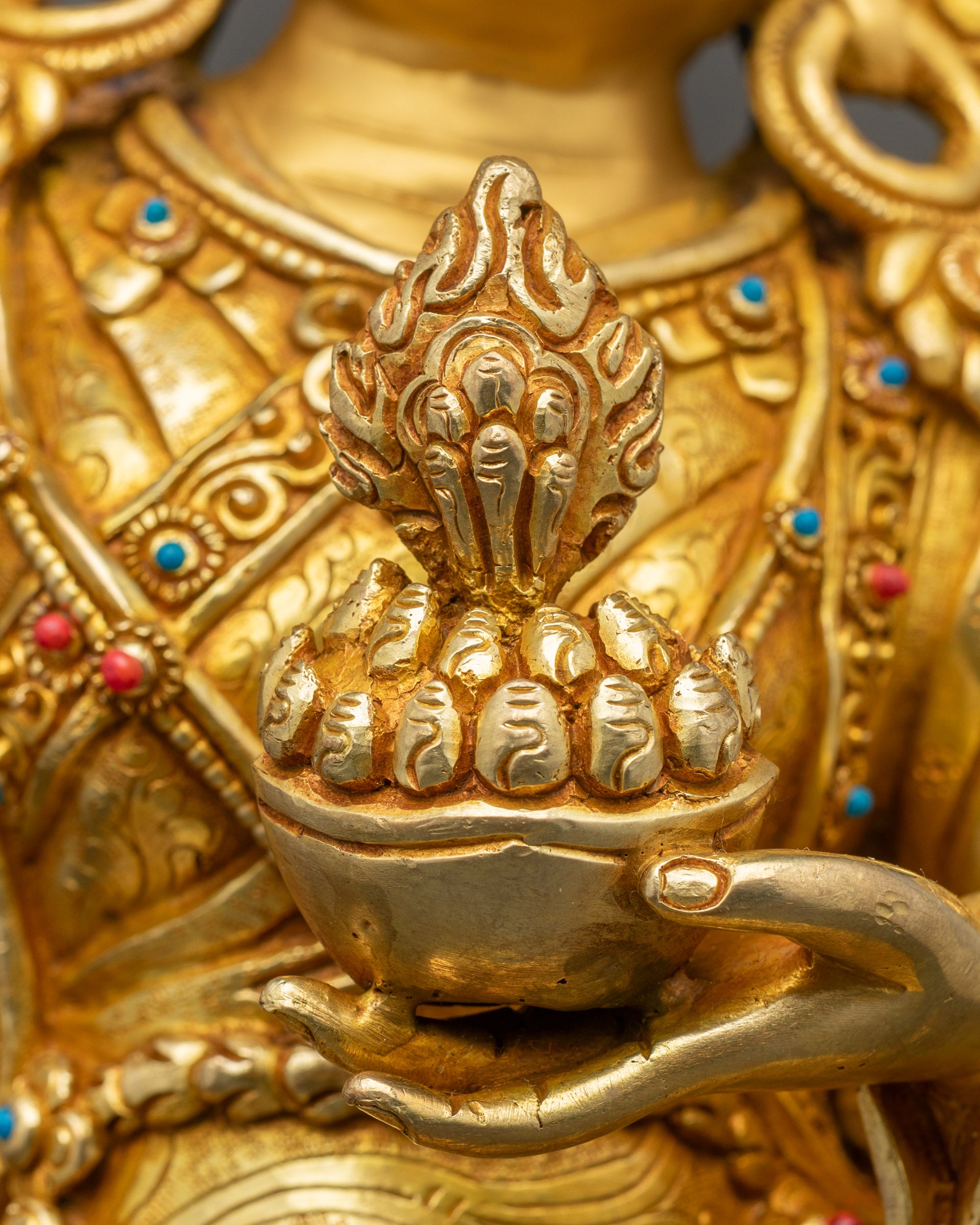 Achi Chokyi Drolma Tibetan Buddhist statue displayed on home altar for protection and guidance