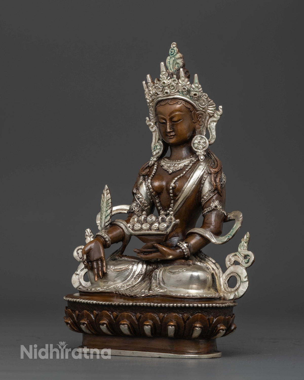 Akasagarbha Buddhist statue with oxidized and silver-plated finish