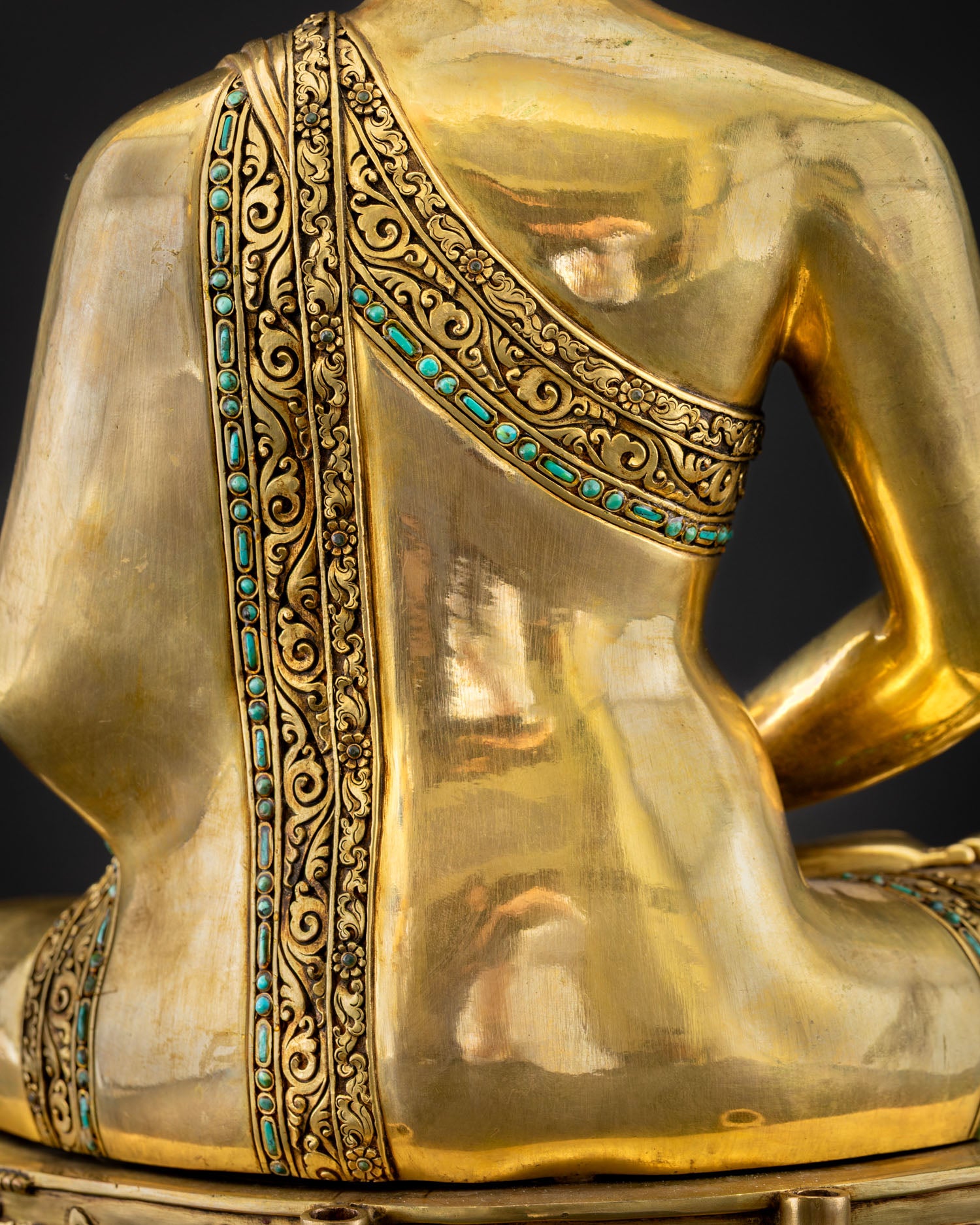 Amitabha Buddha robe shoulder detail, carved scroll patterns, turquoise stone inlay, Nepal