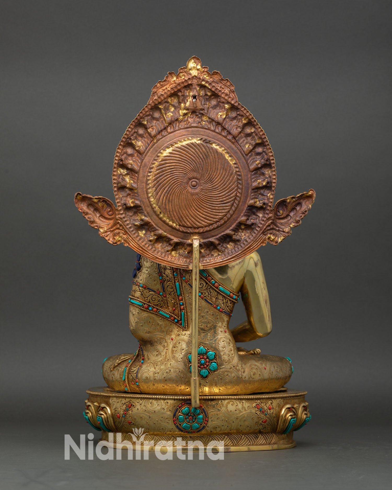 amitabha buddha statue back view, detailed lotus seat and ornate torana design