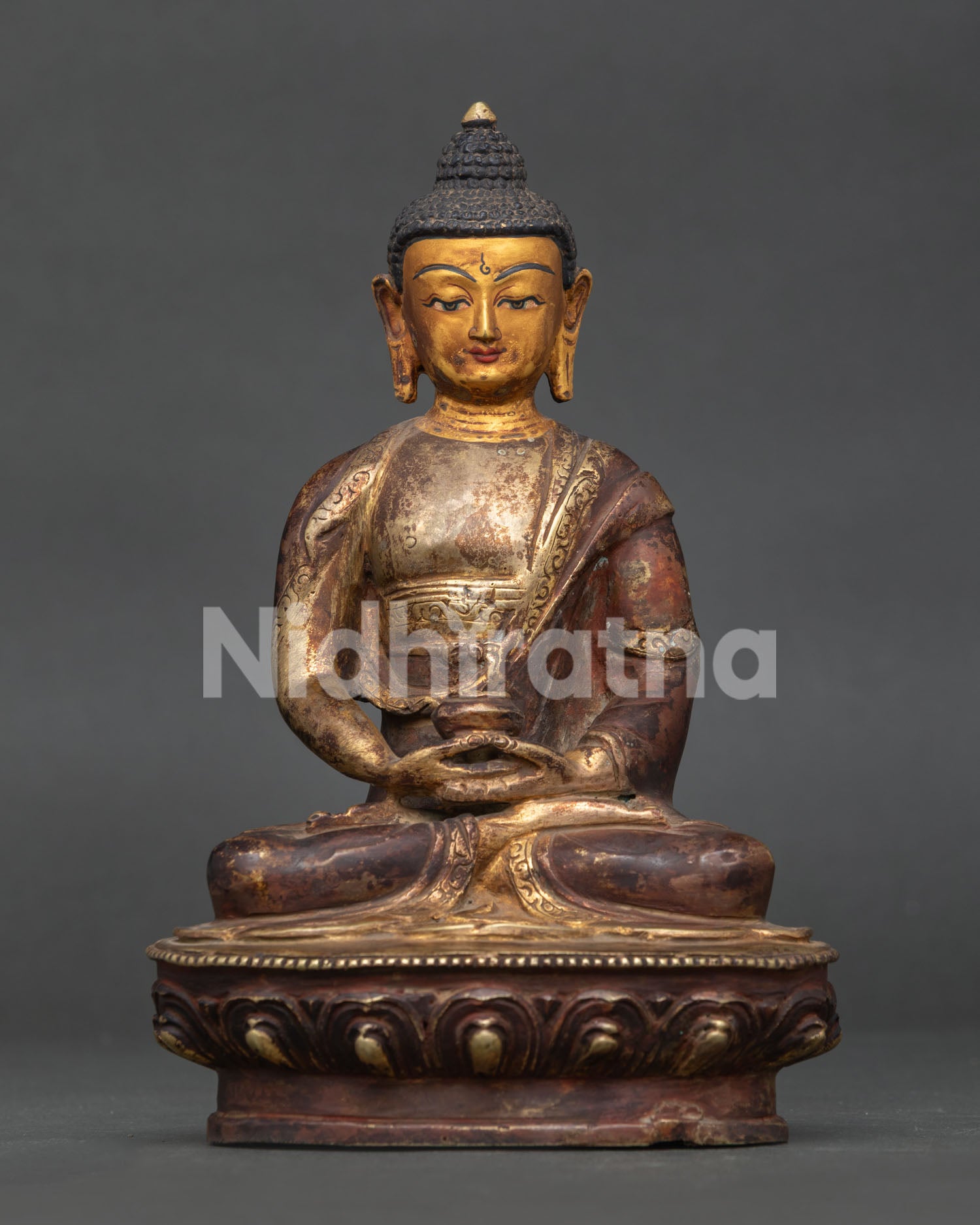 Amitabha Buddha statue handcrafted by Newari artisans in Patan Nepal with gold fire-gilded oxidized finish.