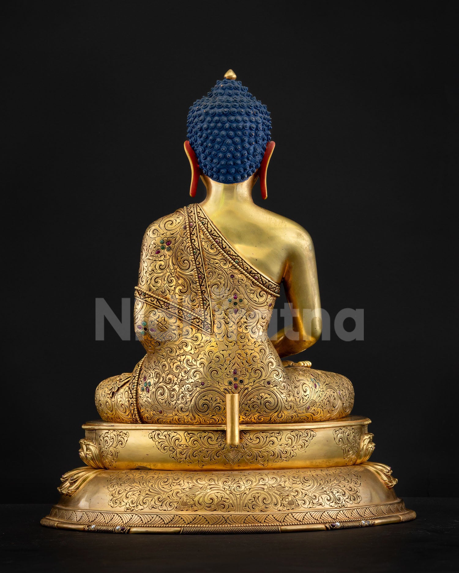Amitabha Buddha statue robe featuring hand‑engraved floral motifs with vibrant gemstone inlays