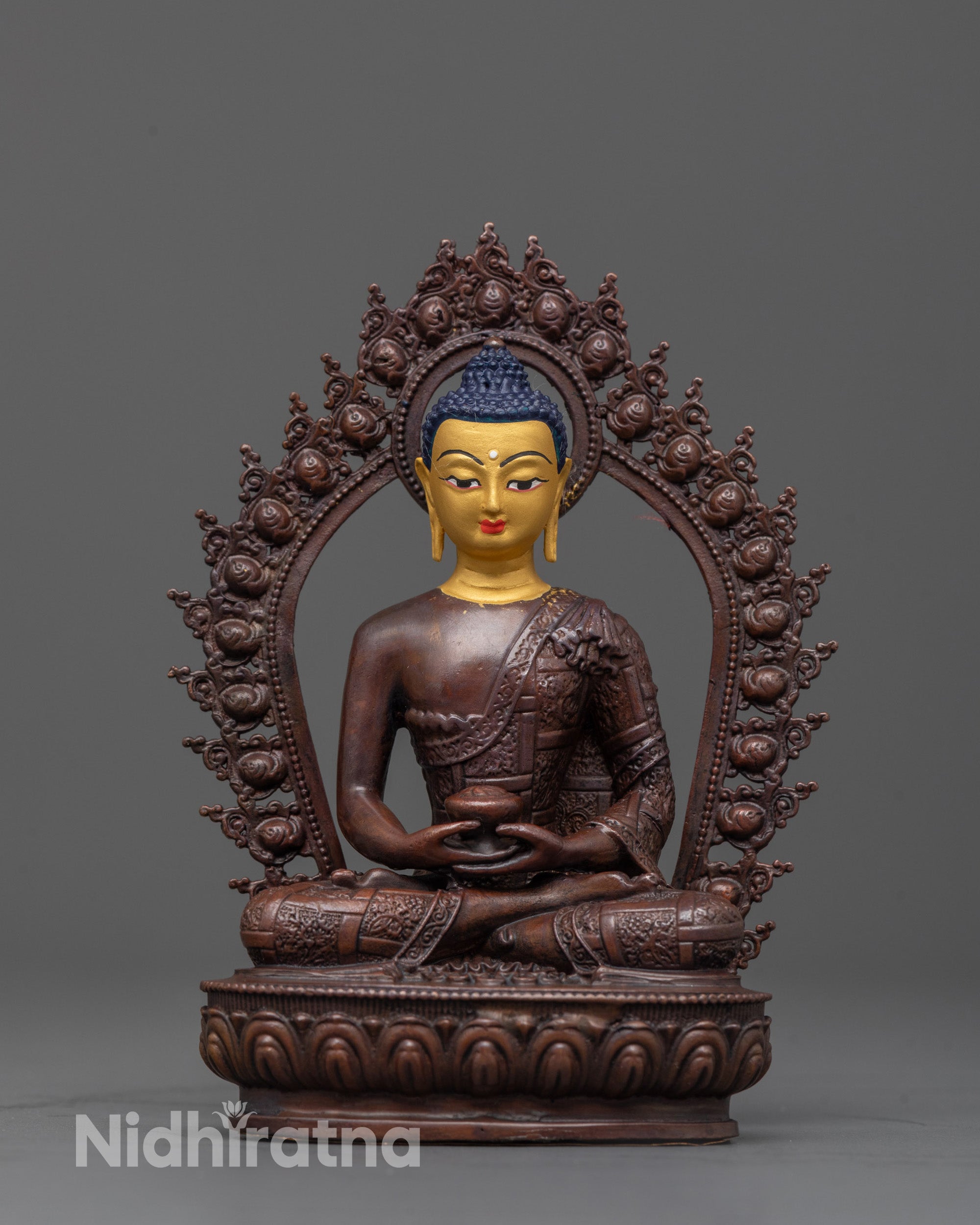 amitabha buddha statue front view with gold face and brown oxidized copper body