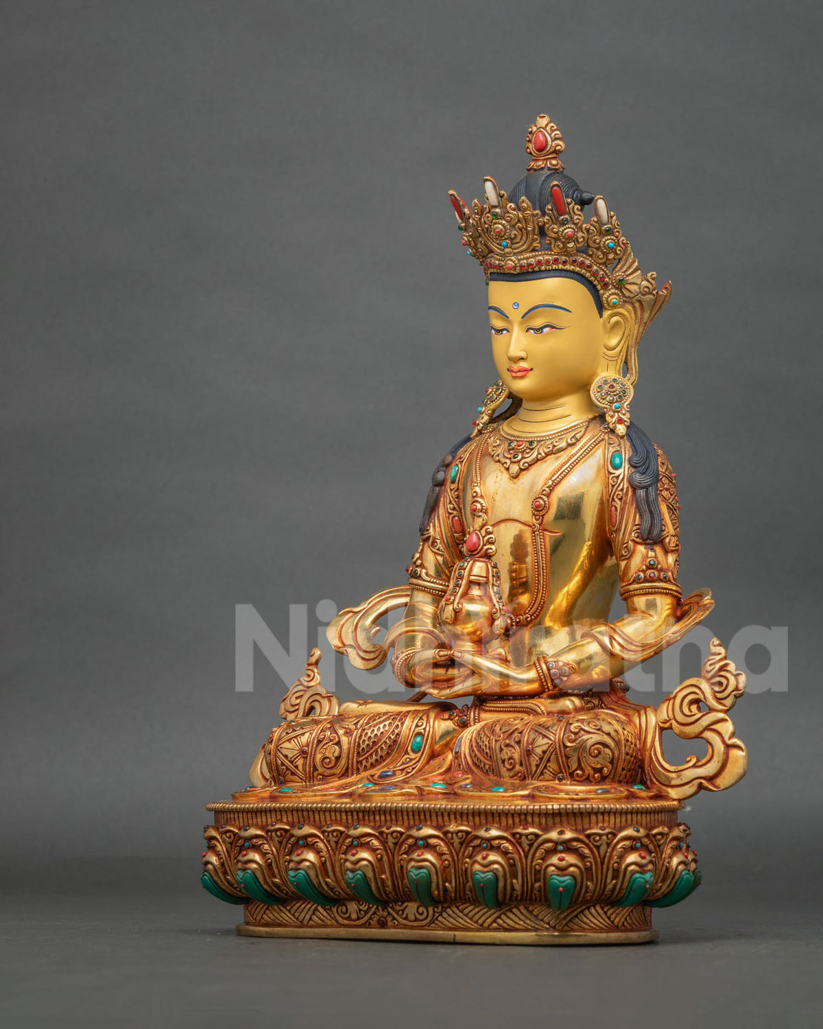 Amitayus sculpture seated in Dhyana Mudra holding a long-life vase, symbolizing longevity and spiritual well-being.