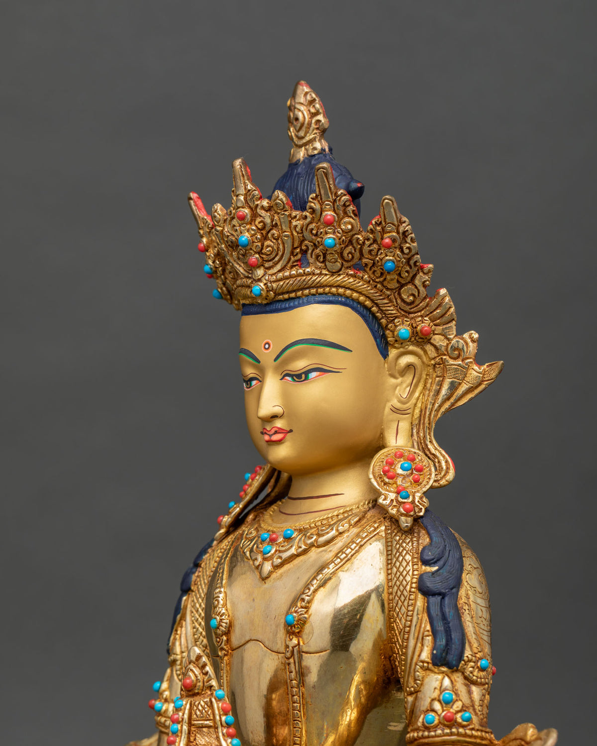 Amitayus Buddha sculpture with gold gilded ornaments and detailed silk garments for Buddhist altars and meditation spaces.
