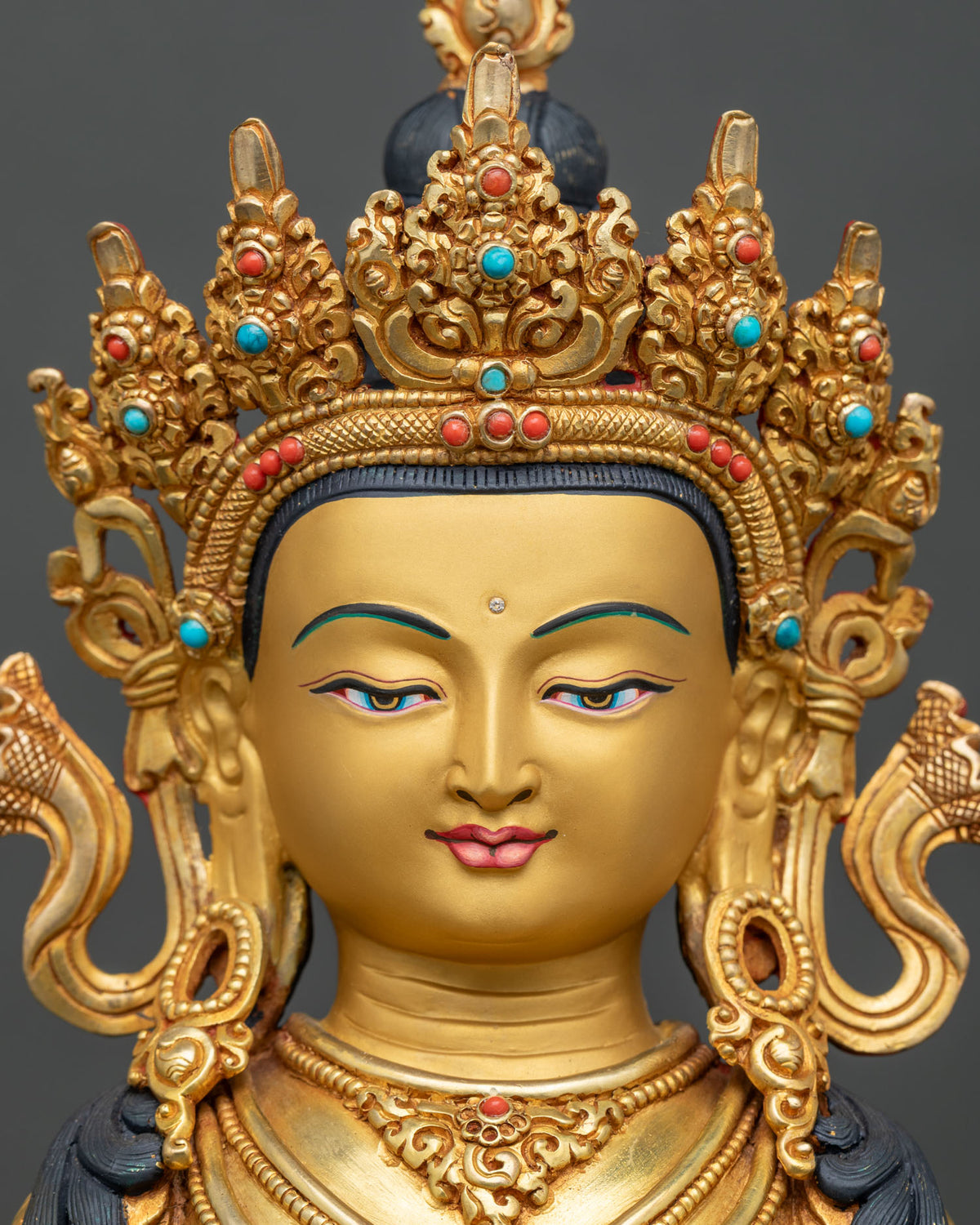 Amitayus Buddha Statue face close up 24K gold painted face five jewel crown.