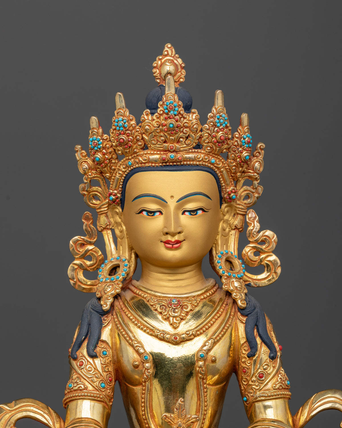Amitayus Buddha statue with 24K gold painted face.