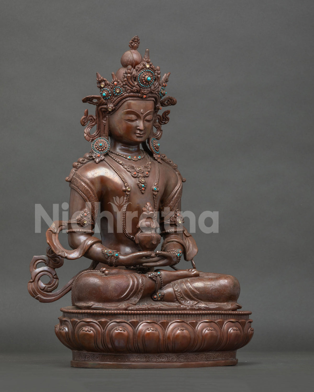 Amitayus buddhist statue seated in meditation on hand carved lotus pedestal.